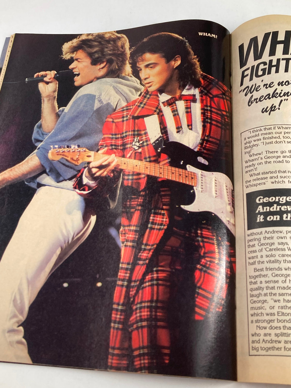 A vibrant image of George Michael and Andrew Ridgeley performing in a live concert, featured in the July 1985 VTG Teen Machine Magazine, highlighting the musical spirit of the 80s.