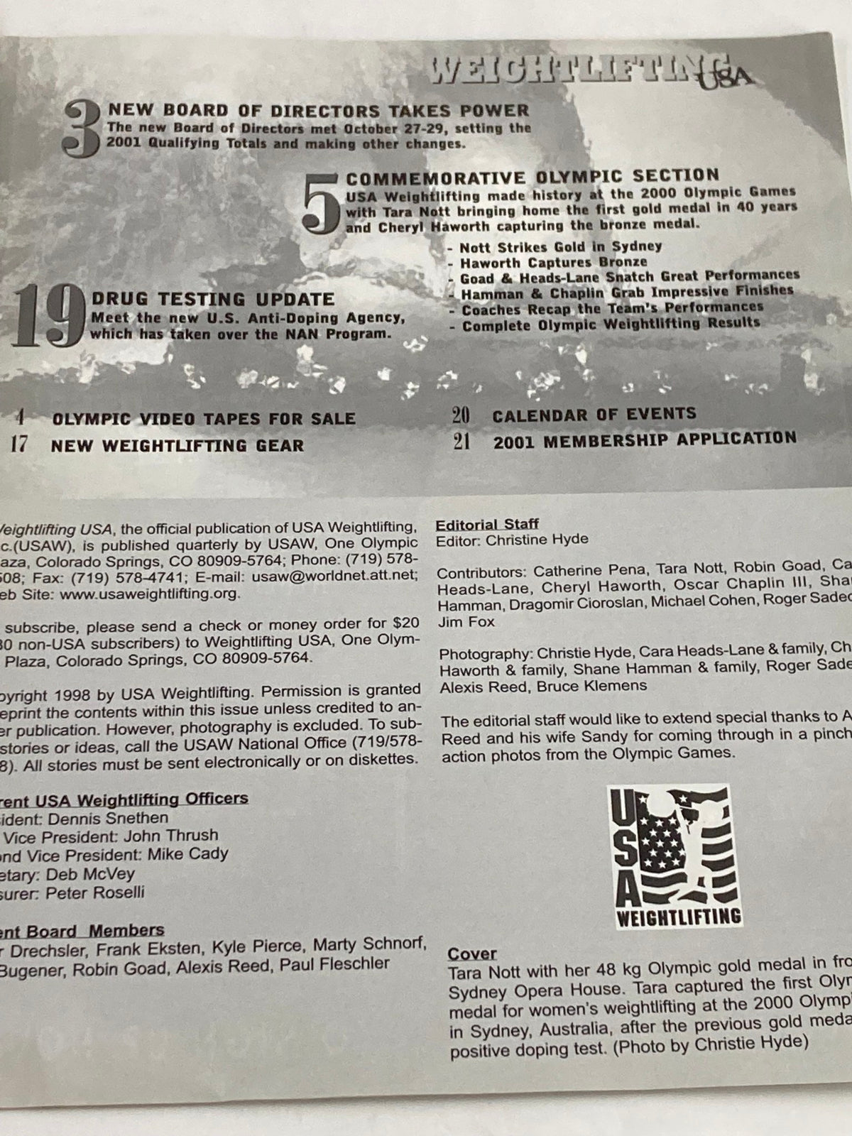 Inside page of the Weightlifting USA Magazine 1998, detailing the Olympic section with highlights of Tara Nott's gold medal win and other Olympic achievements in weightlifting.
