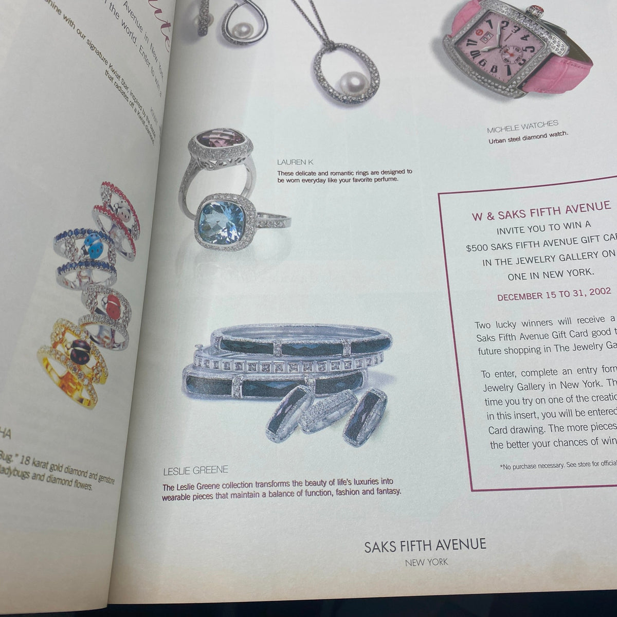 Advertisement page from W Magazine January 2003 highlighting Leslie Greene jewelry collection, featuring elegant ring and bracelet designs.