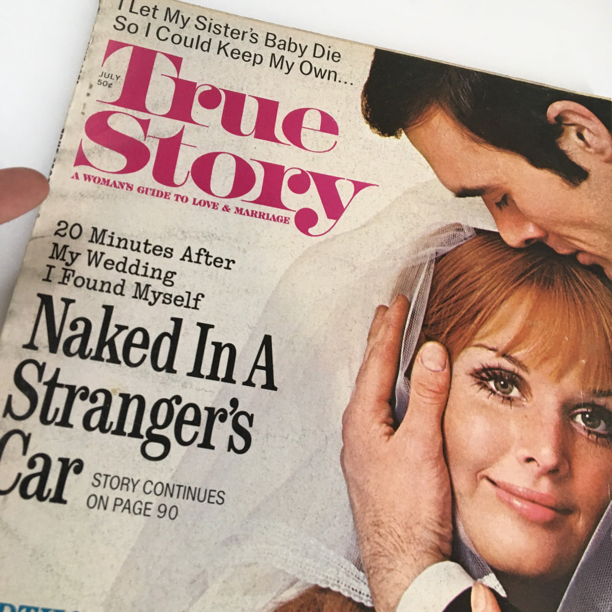 Close-up of the cover of True Story Magazine July 1971, highlighting the story 'Naked In A Stranger's Car.' The cover features a couple with romantic imagery typical of the era.