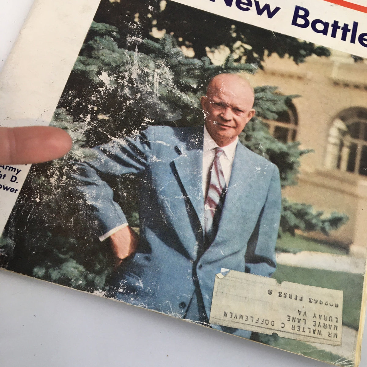 Close-up of the cover of US News & World Report Magazine from June 6, 1952 highlighting 'Ike's New Battle' with visible wear and an address label.