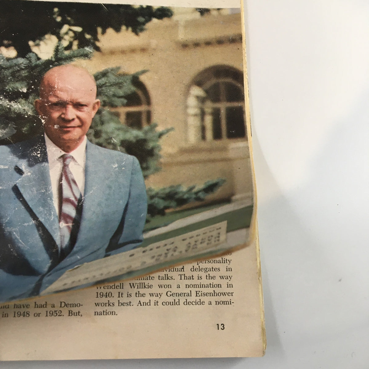 Image of Dwight 'Ike' Eisenhower on the cover of US News & World Report Magazine from June 6, 1952, standing with a backdrop of greenery, emphasizing the article 'Ike's New Battle'.