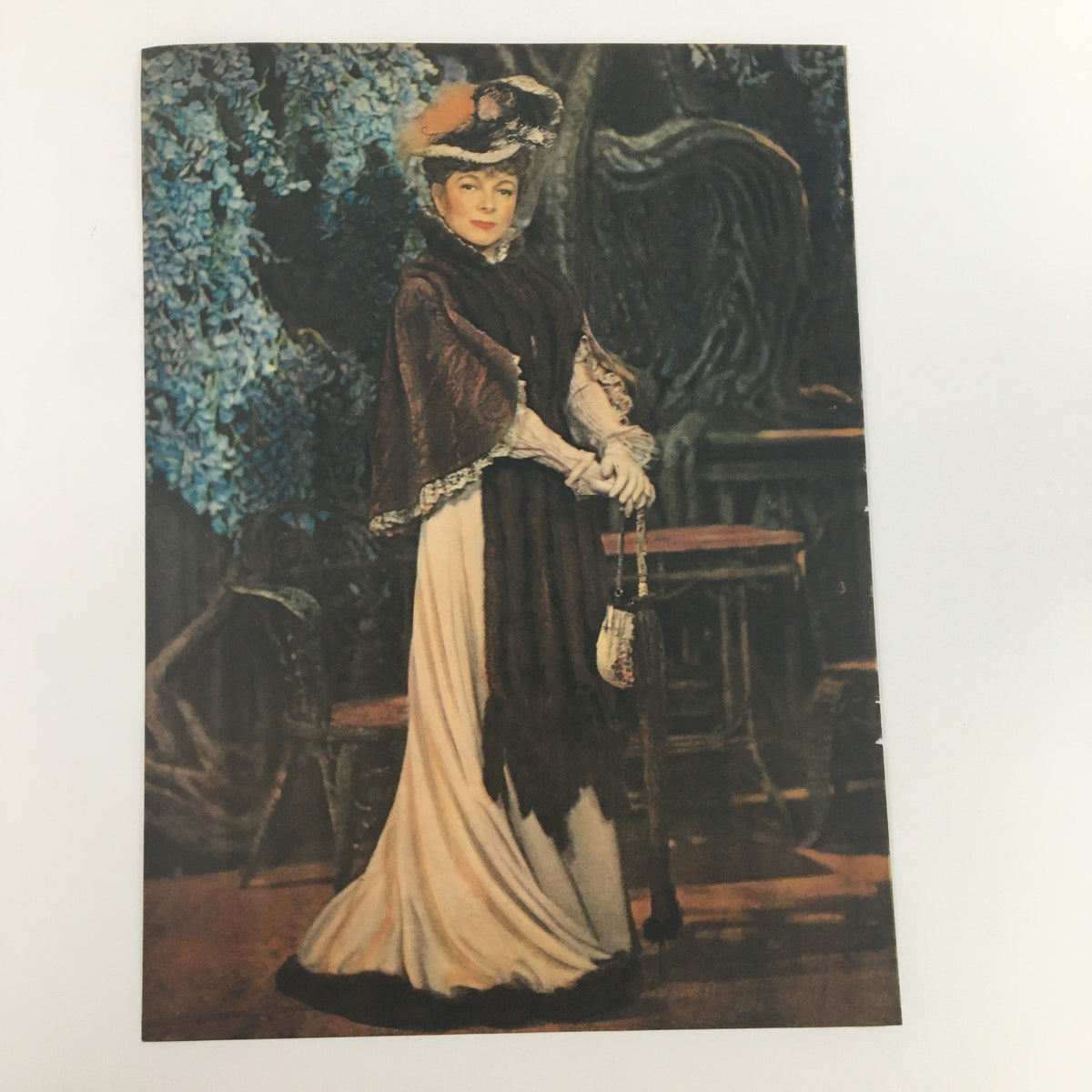Vintage scene depicted in a classic print featuring a woman in historical dress, showcasing an elegant style reminiscent of previous eras.