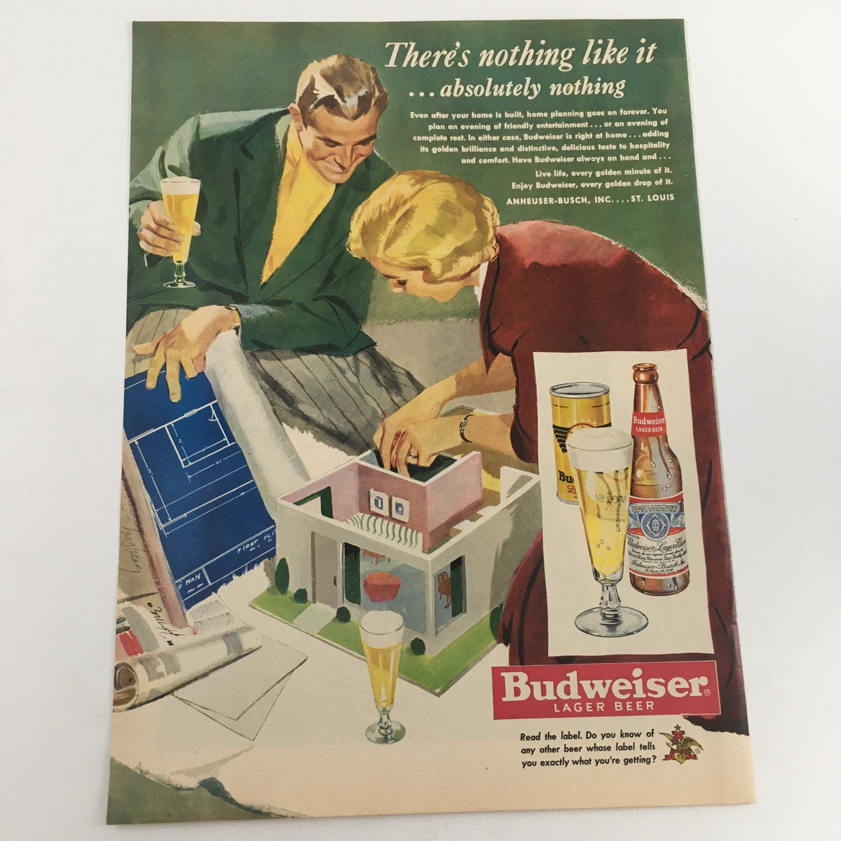 1950 Budweiser Lager Beer Anheuser-Busch Inc. Vintage Print Ad featuring a couple engaging with a model of a building and a layout, showcasing the iconic beer and its advertising style from mid-century America.