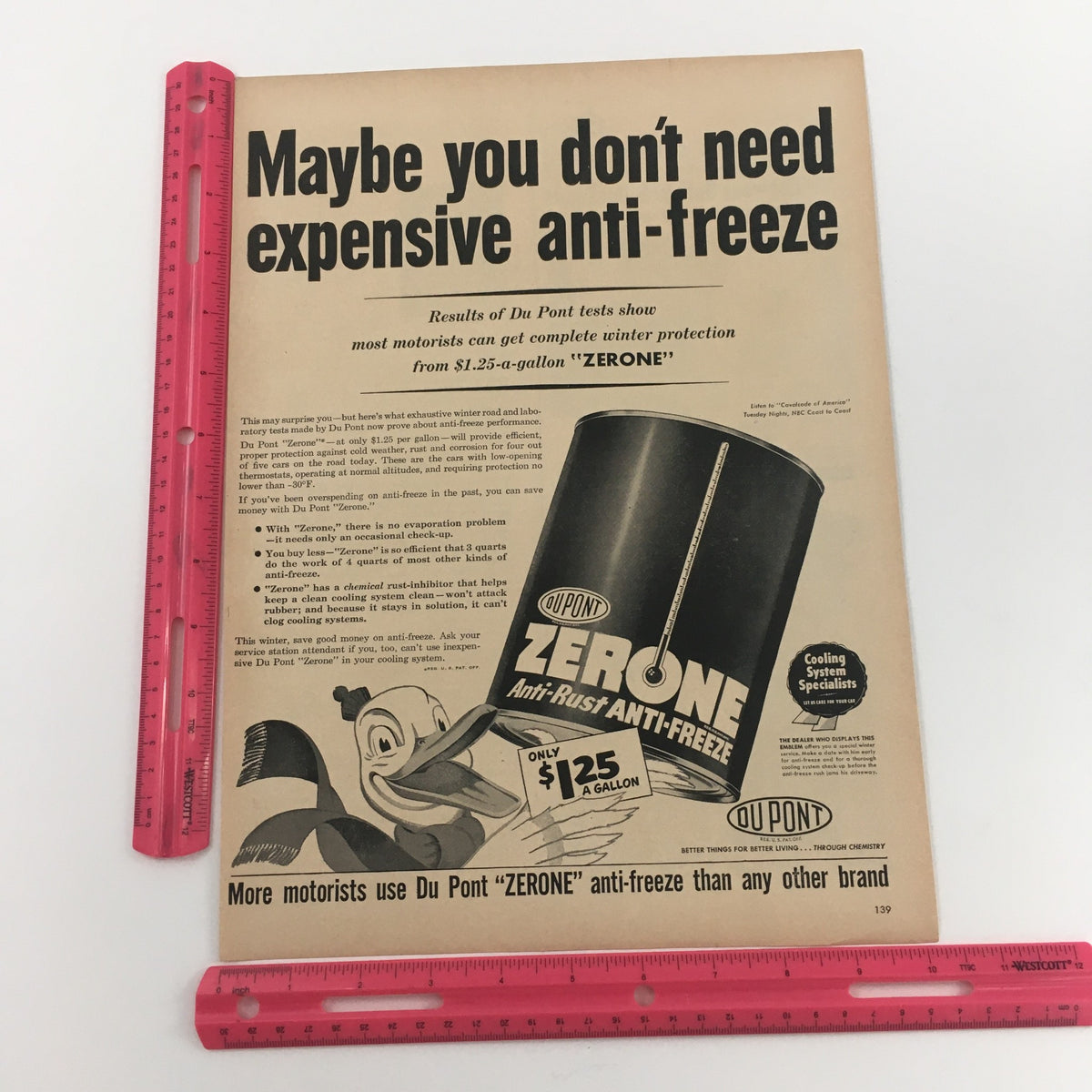 Dupont Zerone Anti-Rust Anti-Freeze advertisement highlighting its cost and benefits, comparing with other brands. Part of the 1950 Dupont Zerone Anti-Rust Anti-Freeze Vintage Print Ad collection.