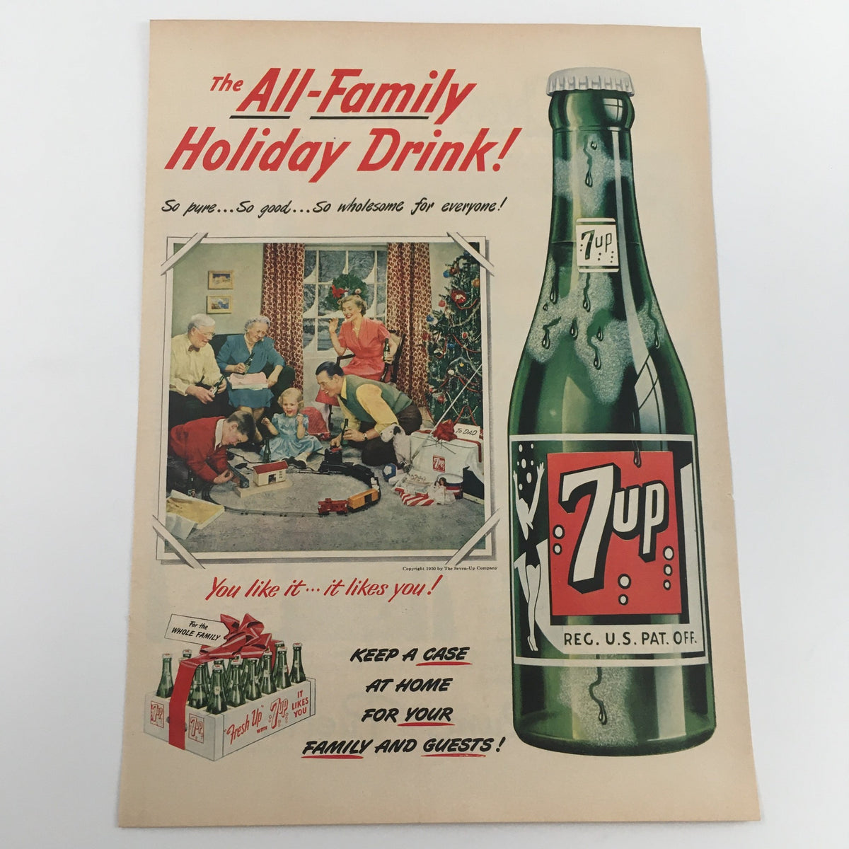 Vintage advertisement for 7Up titled 'The All-Family Holiday Drink!', depicting a cheerful family gathered during the holidays with 7Up prominently displayed.
