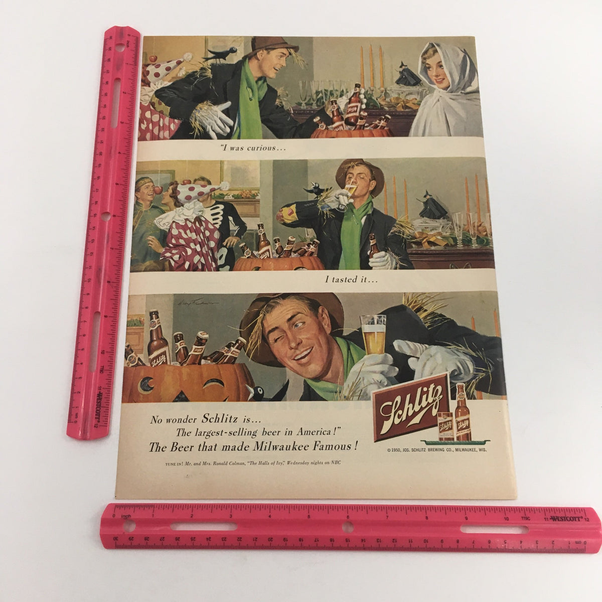 Vibrant 1950 Joseph Schlitz Brewing Company beer ad, featuring a playful scene with measurements displayed, emphasizing the nostalgia and marketing of mid-century American brewing culture.