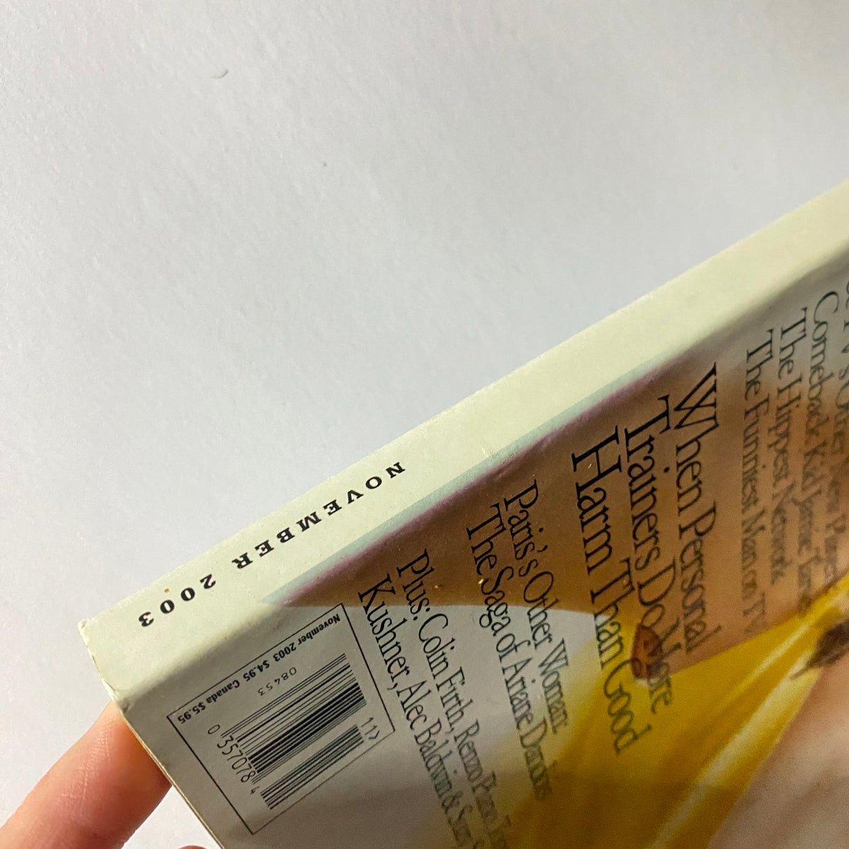 Side view of W Magazine November 2003 highlighting the spine with the publication date for collectors and vintage magazine enthusiasts.