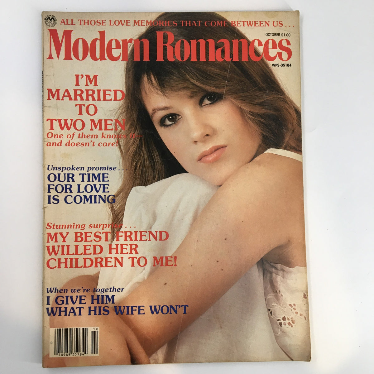 Cover of Modern Romances Magazine October 1982, titled 'I'm Married To Two Men,' featuring a beautiful model with long hair and intriguing headlines about love and relationships.