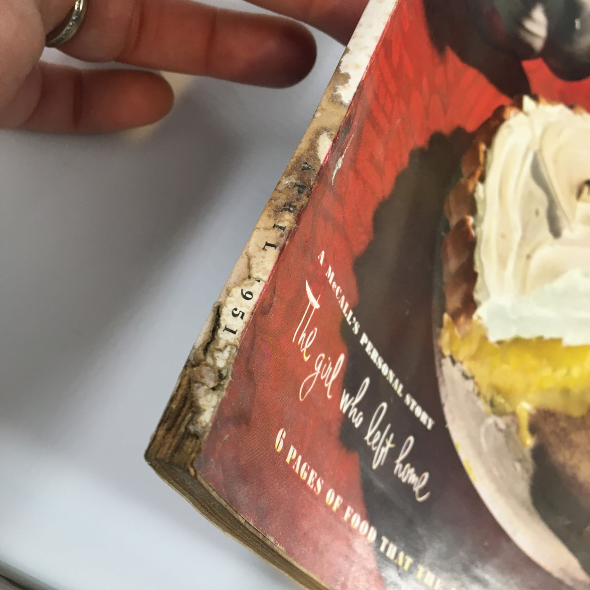 Spine view of VTG McCall's Magazine April 1951 showing minor wear and the title 'The Girl Who Left Home'.