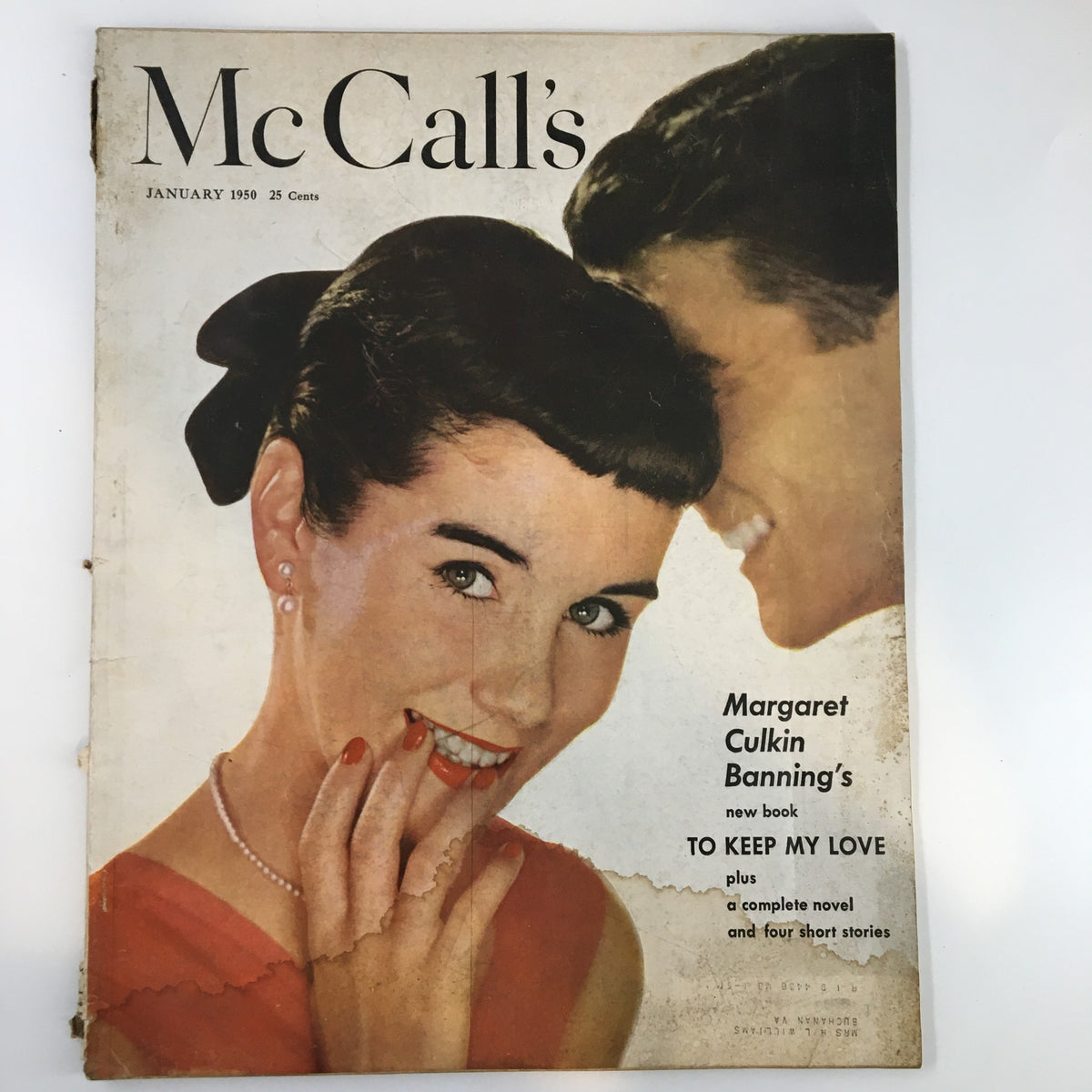 Cover of VTG McCall's Magazine January 1950 featuring Margaret Culkin Banning's new book 'To Keep My Love', showcasing a vintage style illustration with a smiling woman in a red dress.