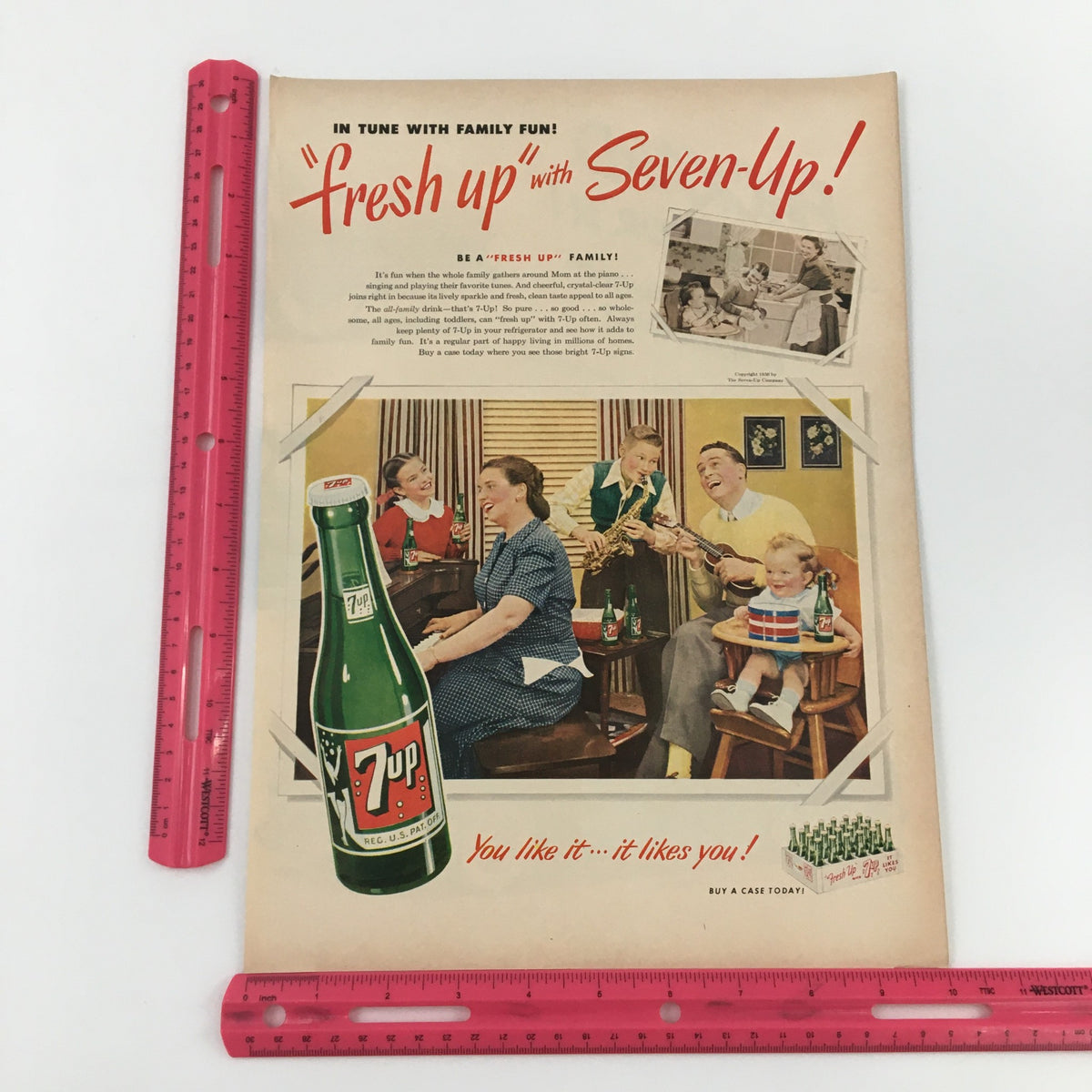 Close-up view of the 1950 Packard Super Deluxe Eight Club Getaway Classics vintage advertisement with a Seven-Up theme, highlighting family fun and nostalgia.