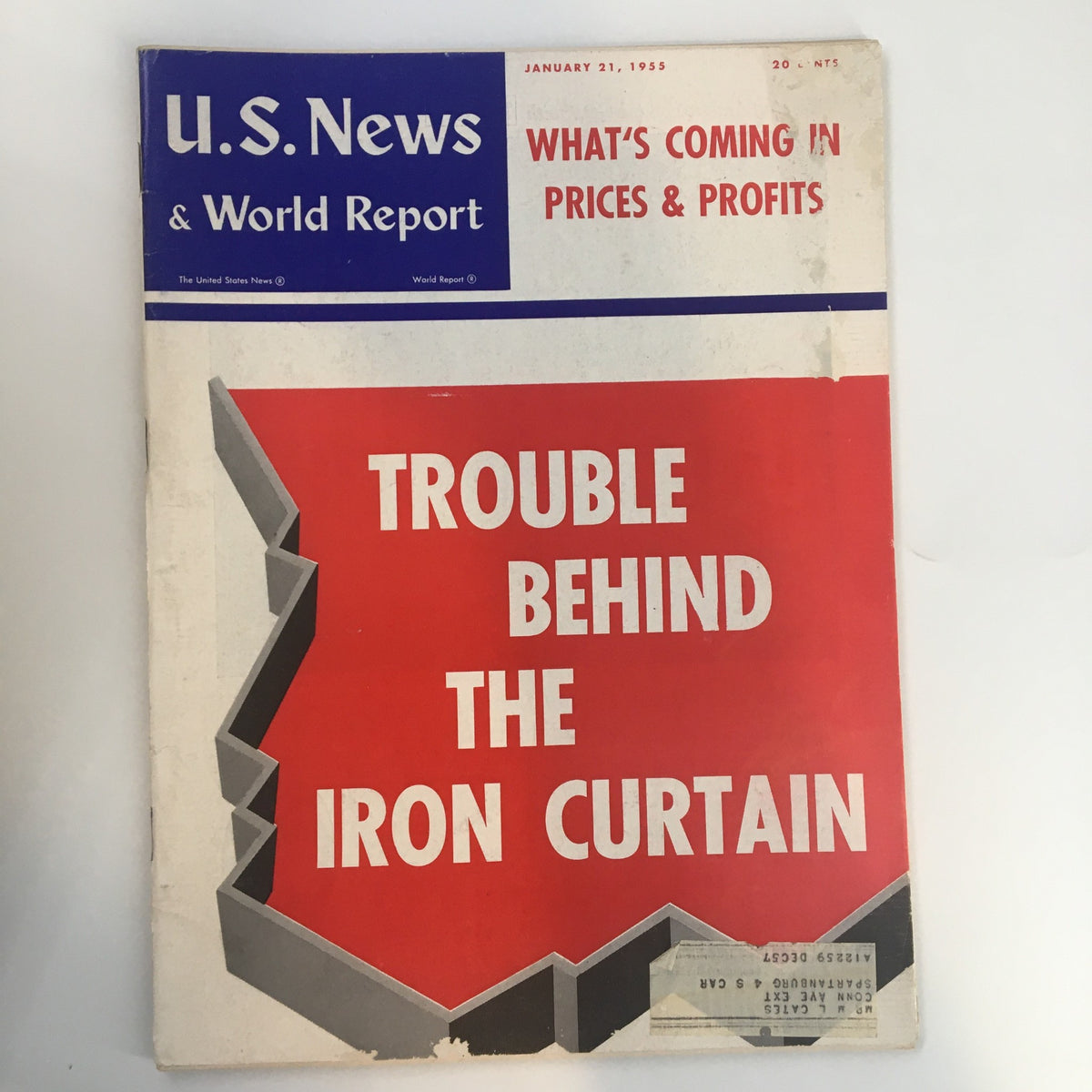 Cover of US News & World Report Magazine January 21 1955, featuring the headline 'Trouble Behind The Iron Curtain' with a striking red background, highlighting Cold War themes.