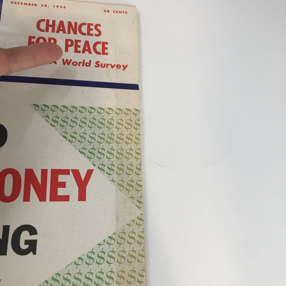 Close-up of the US News & World Report Magazine from December 28, 1956, highlighting the title 'Chances For Peace - A World Survey' and the article on saving money.