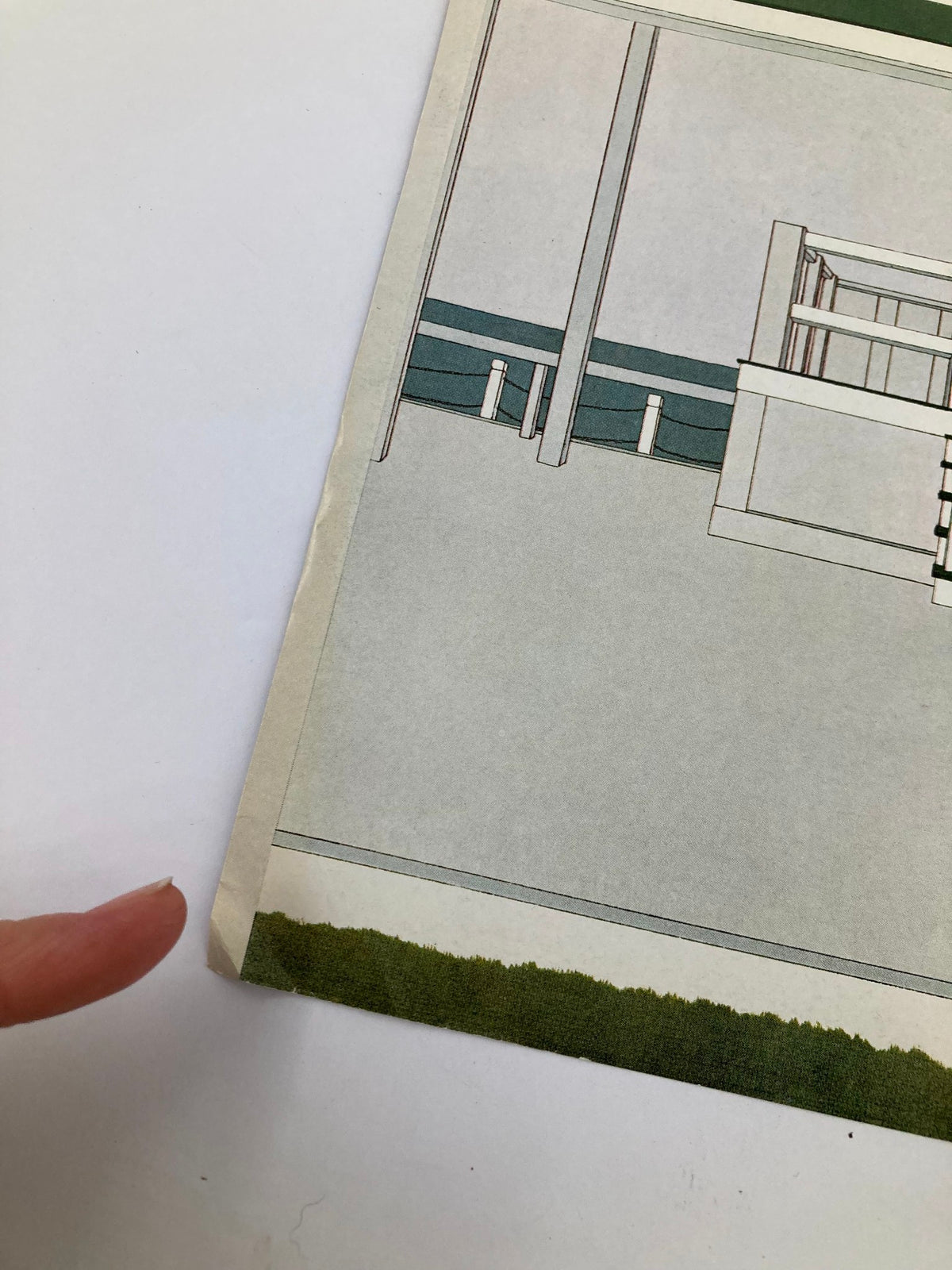 Detail view of the cover of The New Yorker July 14, 1980, featuring the artwork 'Stairs' by Gretchen Dow Simpson, showcasing the unique design at the corner of the publication.