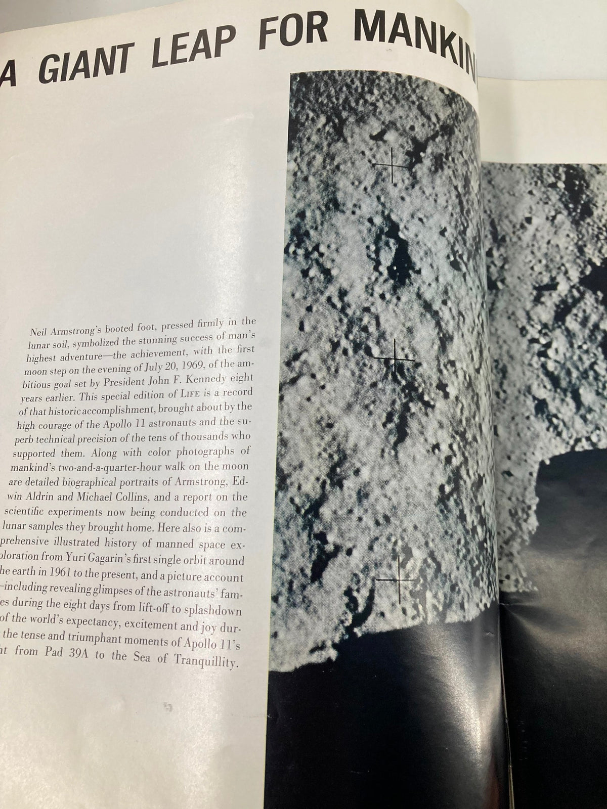 A close-up of the lunar surface taken from the VTG Life Magazine 1969 To The Moon and Back, featuring Neil Armstrong's boot in the moon soil.