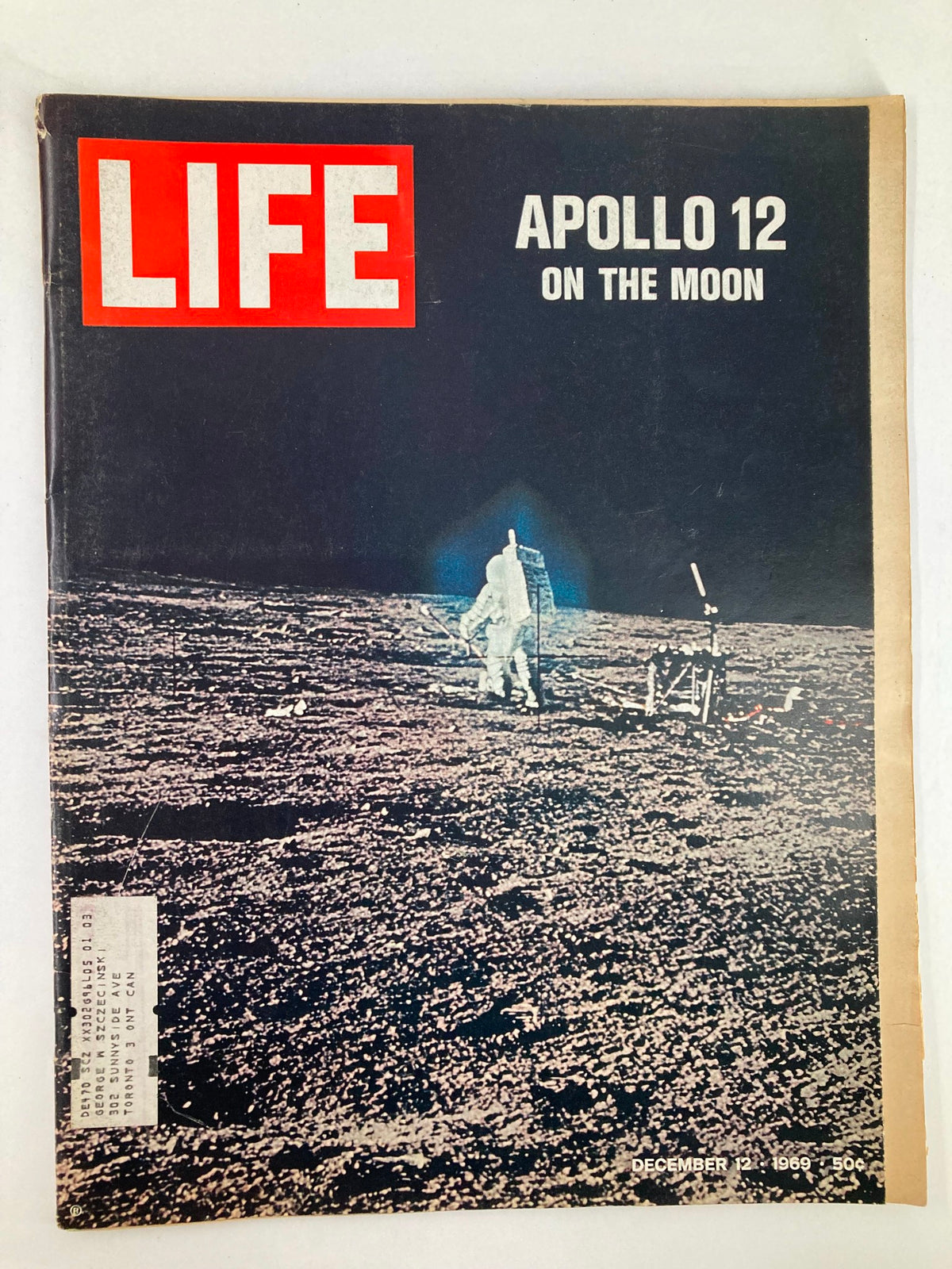 Cover of VTG Life Magazine December 12 1969 featuring the Apollo 12 mission on the moon with astronaut and lunar landscape.