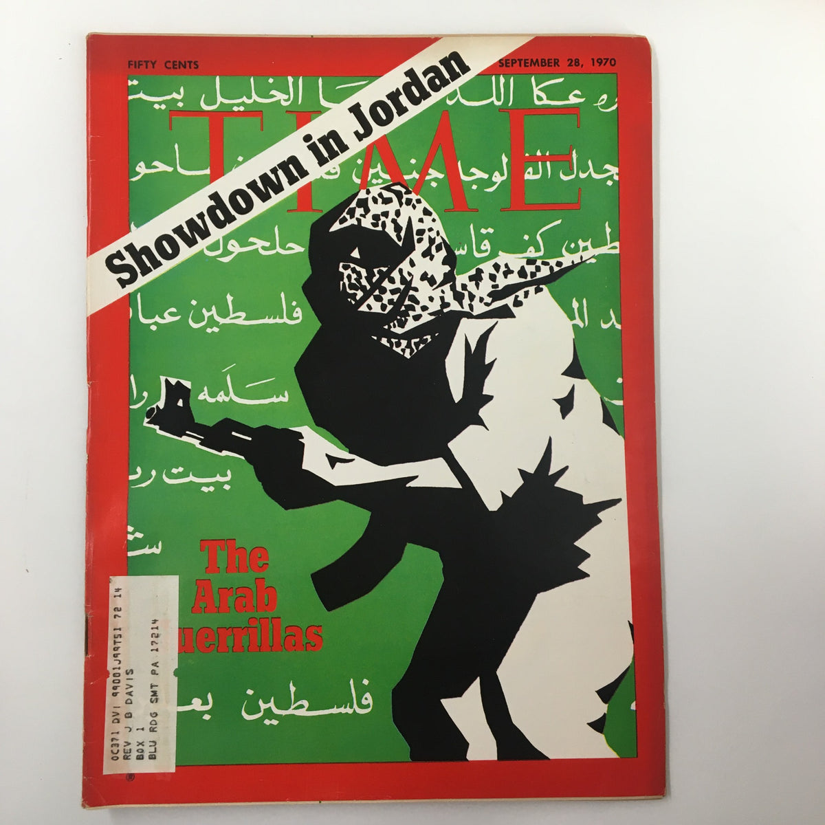 Vintage Time Magazine cover from September 28, 1970 featuring the title 'Showdown in Jordan: The Arab Guerillas'. The cover showcases a silhouette of a figure holding a weapon against a vibrant green background with Arabic text, symbolizing the historical context of Middle Eastern conflicts.
