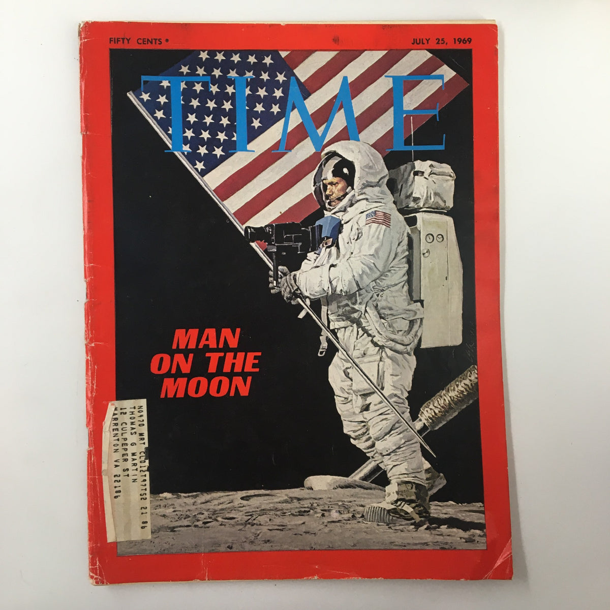 VTG Time Magazine July 25 1969 featuring Neil Armstrong on the Moon cover, showcasing an astronaut with the American flag and prominent text 'MAN ON THE MOON'.