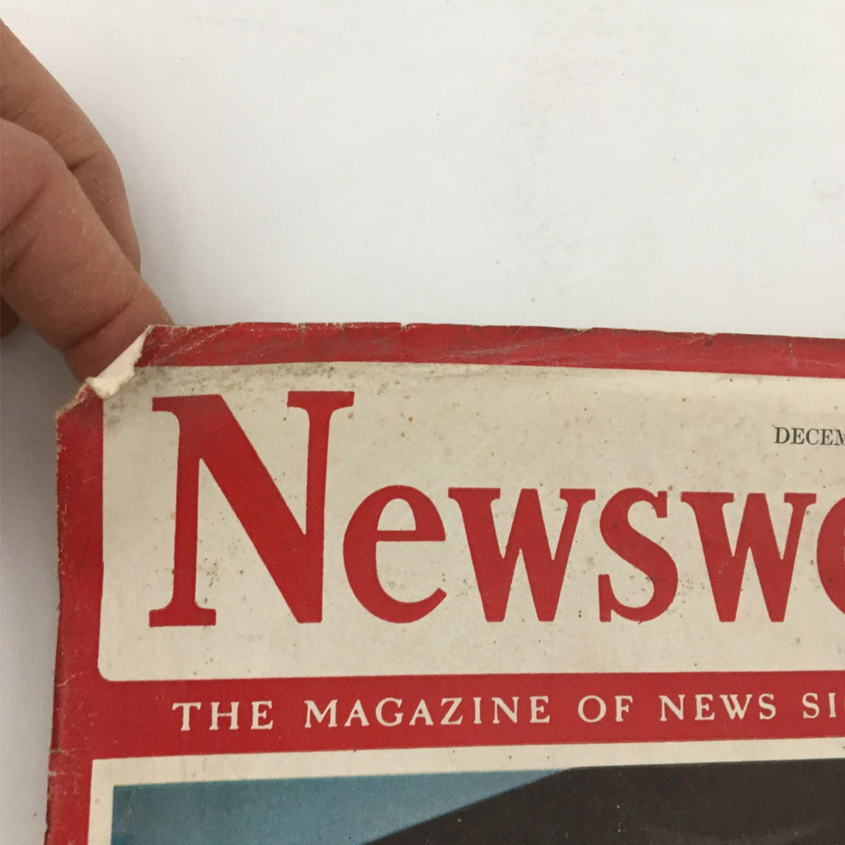 Detail of the top of the Newsweek Magazine December 28, 1942 showing the magazine's title and date, highlighting its vintage appearance.