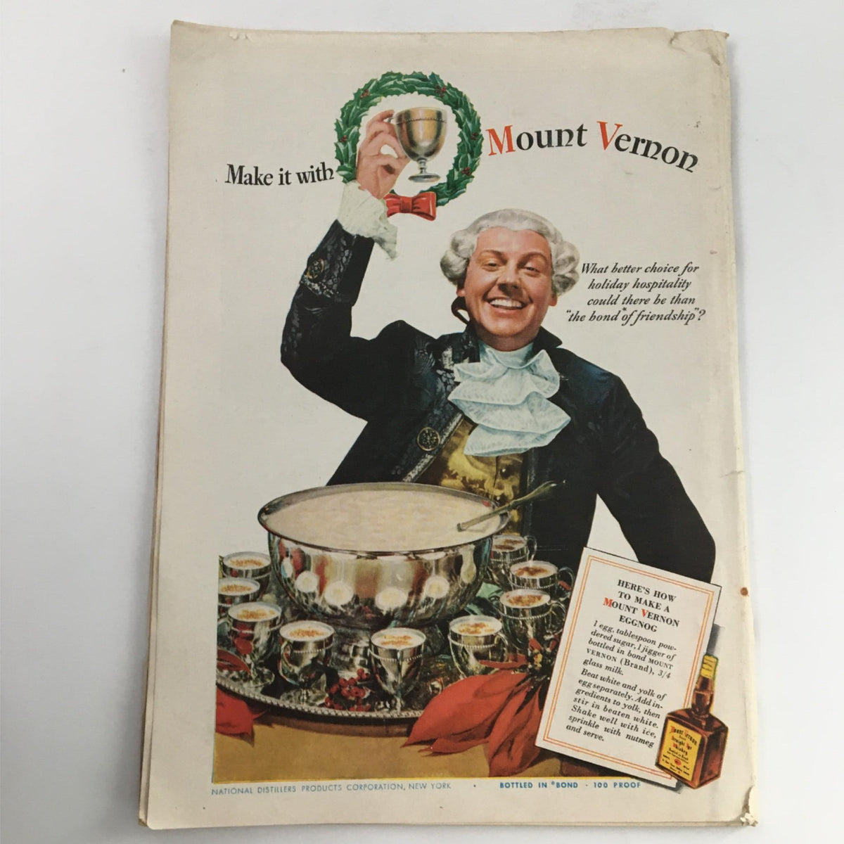 Cover of Newsweek Magazine December 28, 1942 entitled 'Merry Xmas to Hirohito', featuring a man in formal attire holding a cup while surrounded by festive elements.