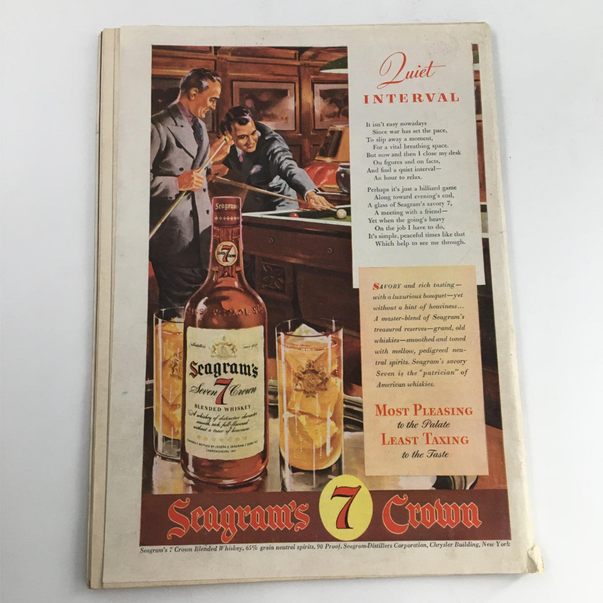 Back cover of Newsweek Magazine January 18, 1943, displaying an advertisement for Seagram's 7 Crown whiskey. The ad features two men playing billiards and emphasizes relaxation with the tagline 'Quiet Interval.' This image enhances the vintage charm of the magazine.