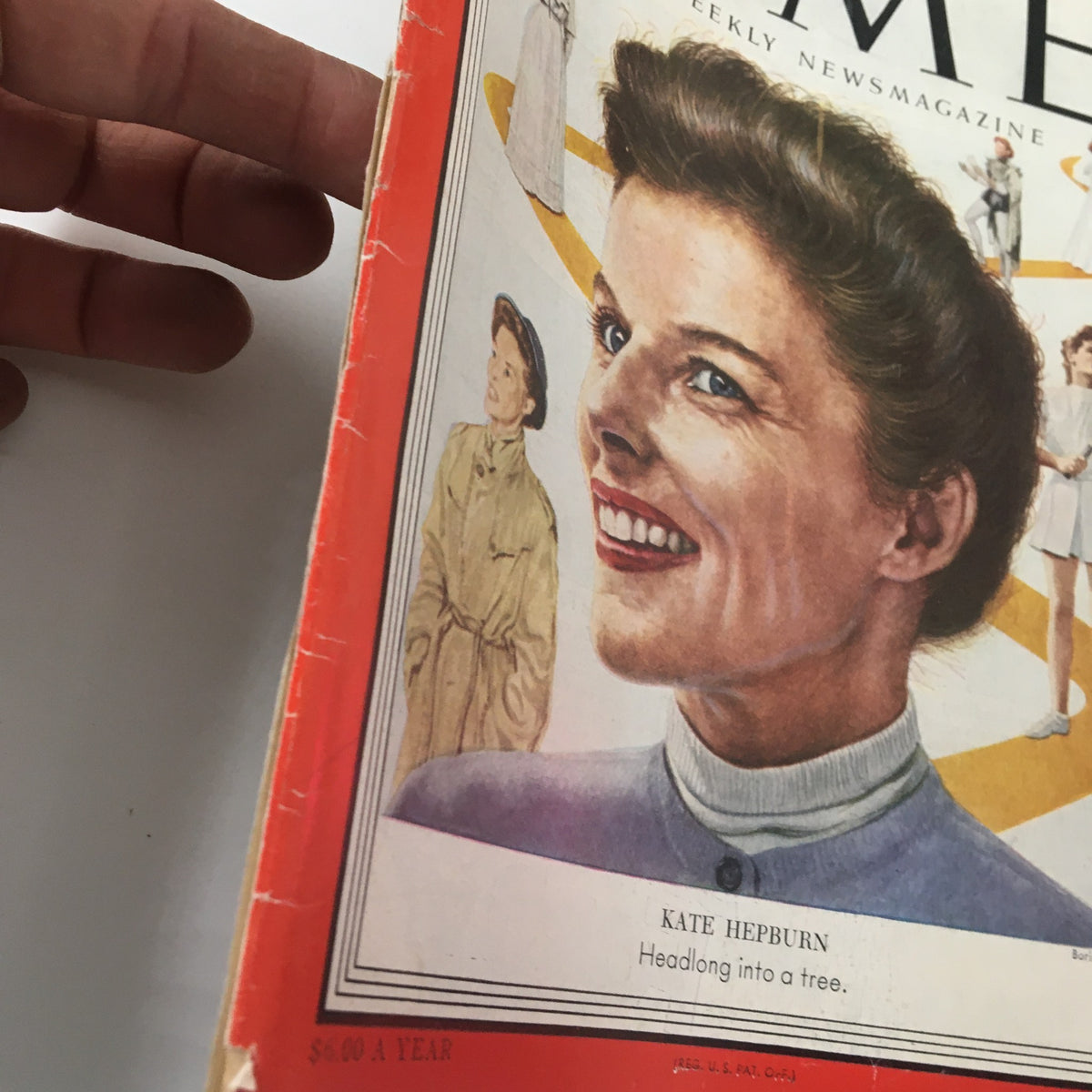 Close-up of the Time Magazine cover from September 1, 1952, showing Kate Hepburn's smiling portrait and the text 'Headlong into a tree'. The cover highlights vintage design elements typical of the 1950s.