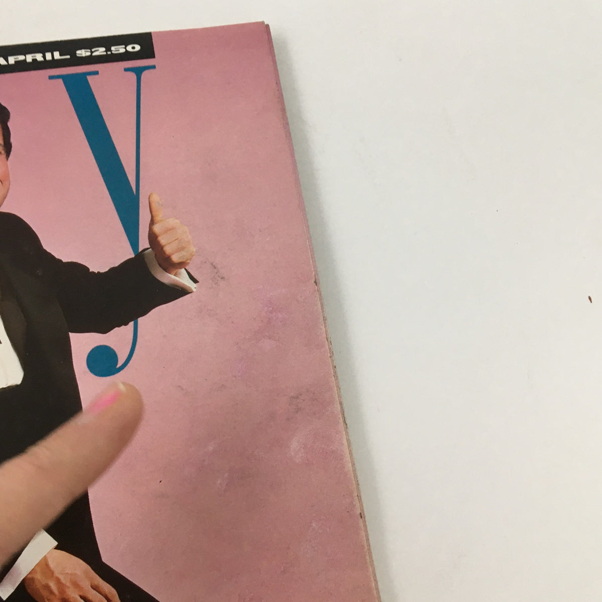 Cover of Spy Magazine April 1988 featuring Donald Trump and Paul Simon with the title 'Mr. Generosity', showcasing a vibrant pink background and a thumbs-up gesture, indicative of 1980s pop culture.