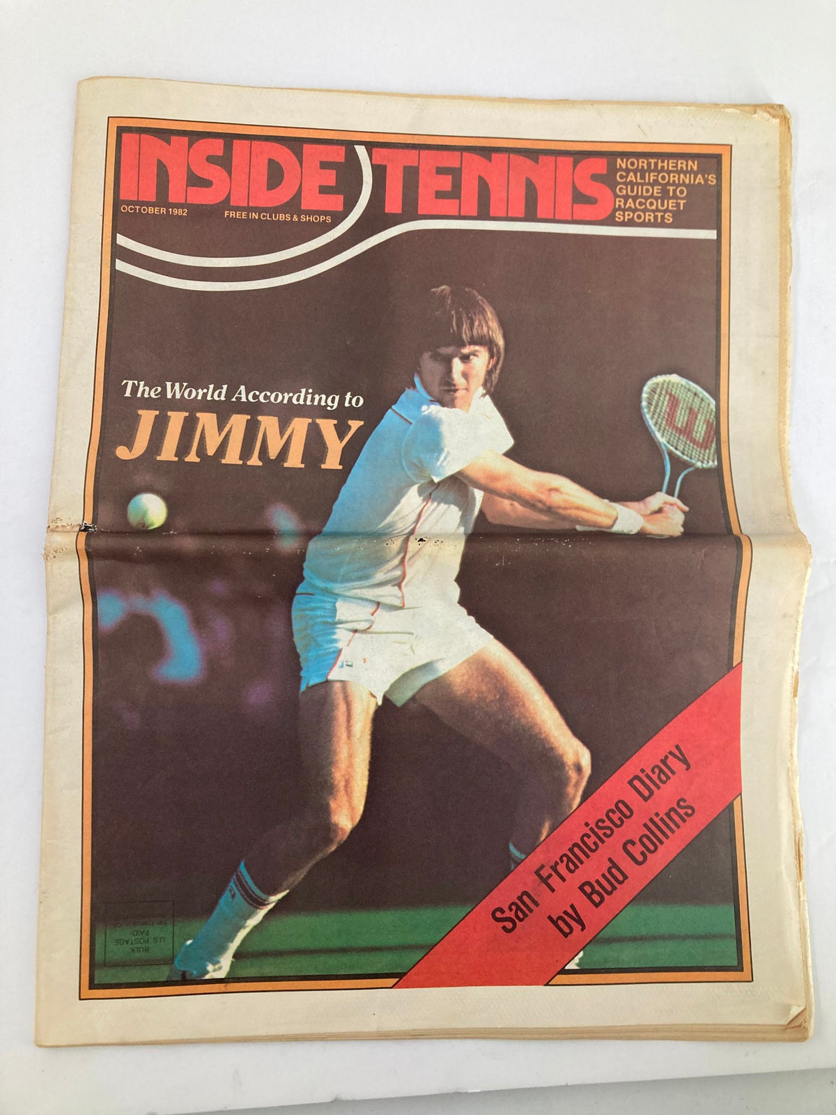 VTG Inside Tennis Magazine October 1982 featuring 'The World According to Jimmy' cover, showcasing a tennis player in action with a yellow tennis ball and vibrant magazine design.