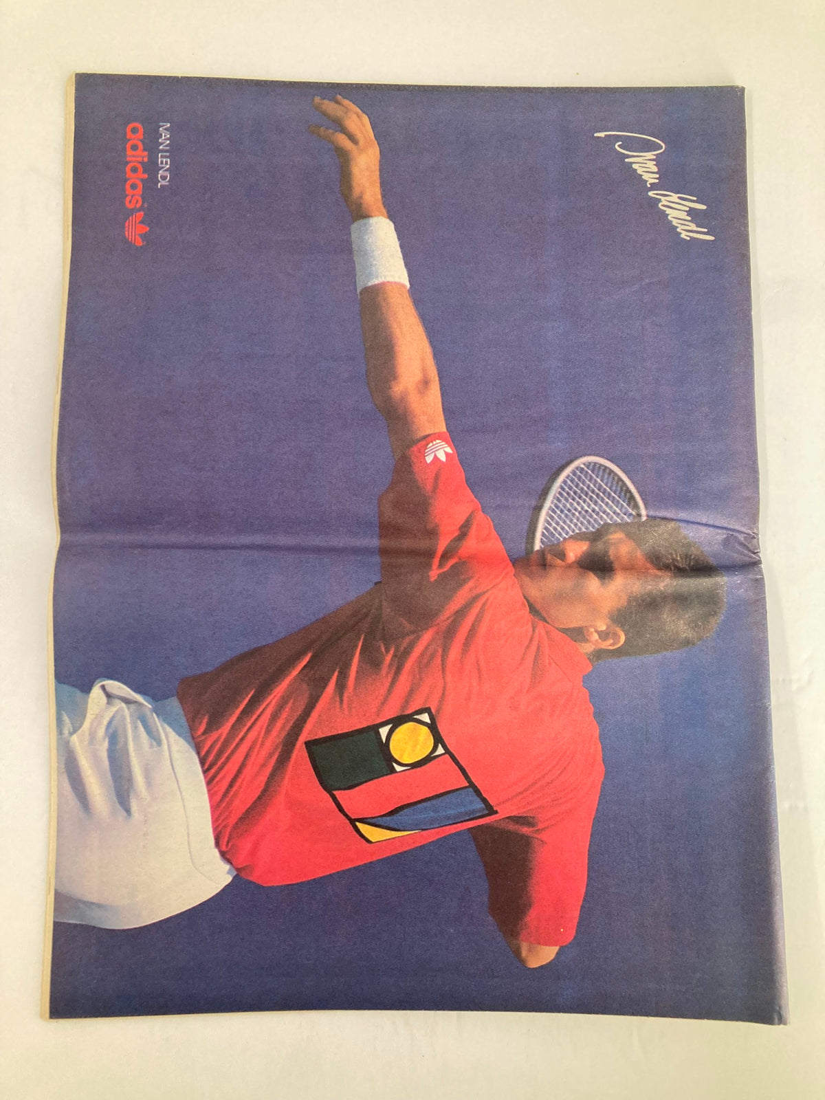 Back cover of Inside Tennis Magazine July 1989 featuring Ivan Lendl in an adidas outfit with a focus on his dynamic serving motion. The title, 'Inside Tennis Magazine July 1989', emphasizes the magazine's collectible nature.