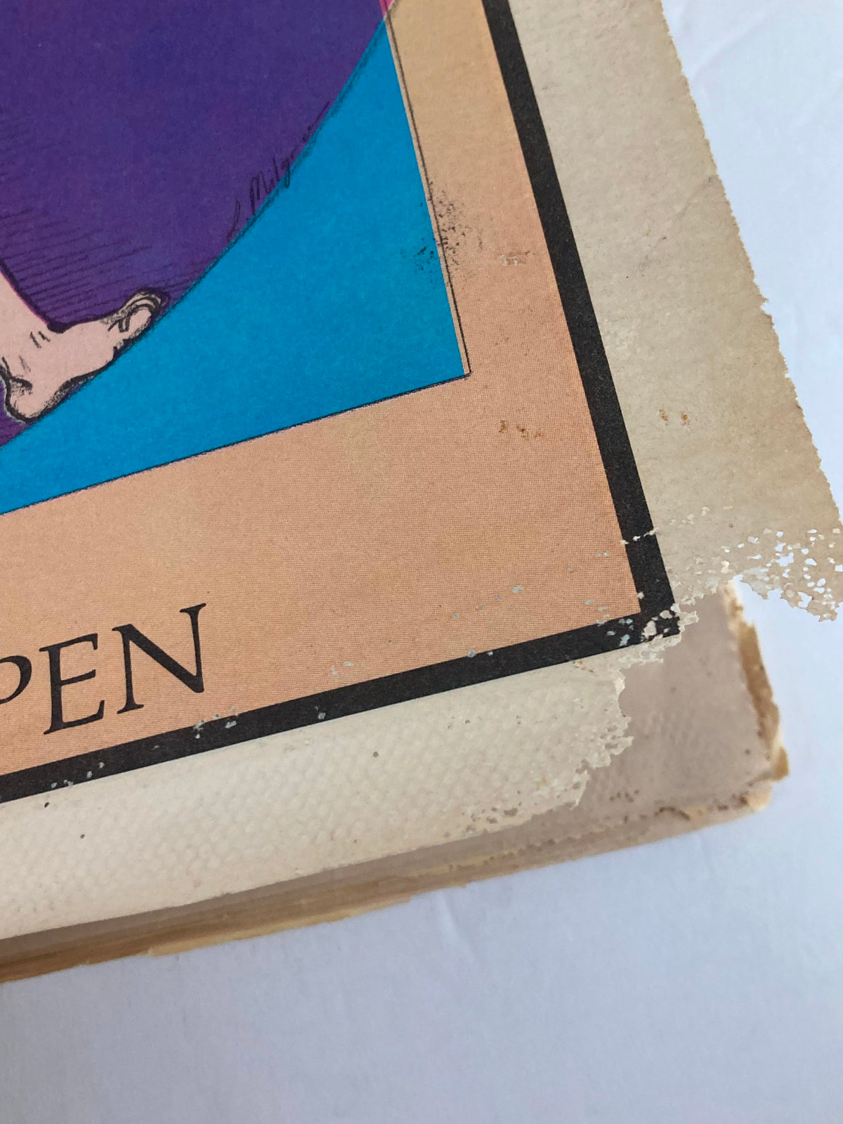 Close-up of the edge of Inside Tennis Magazine November 1984, highlighting the vintage wear and tear consistent with its age.