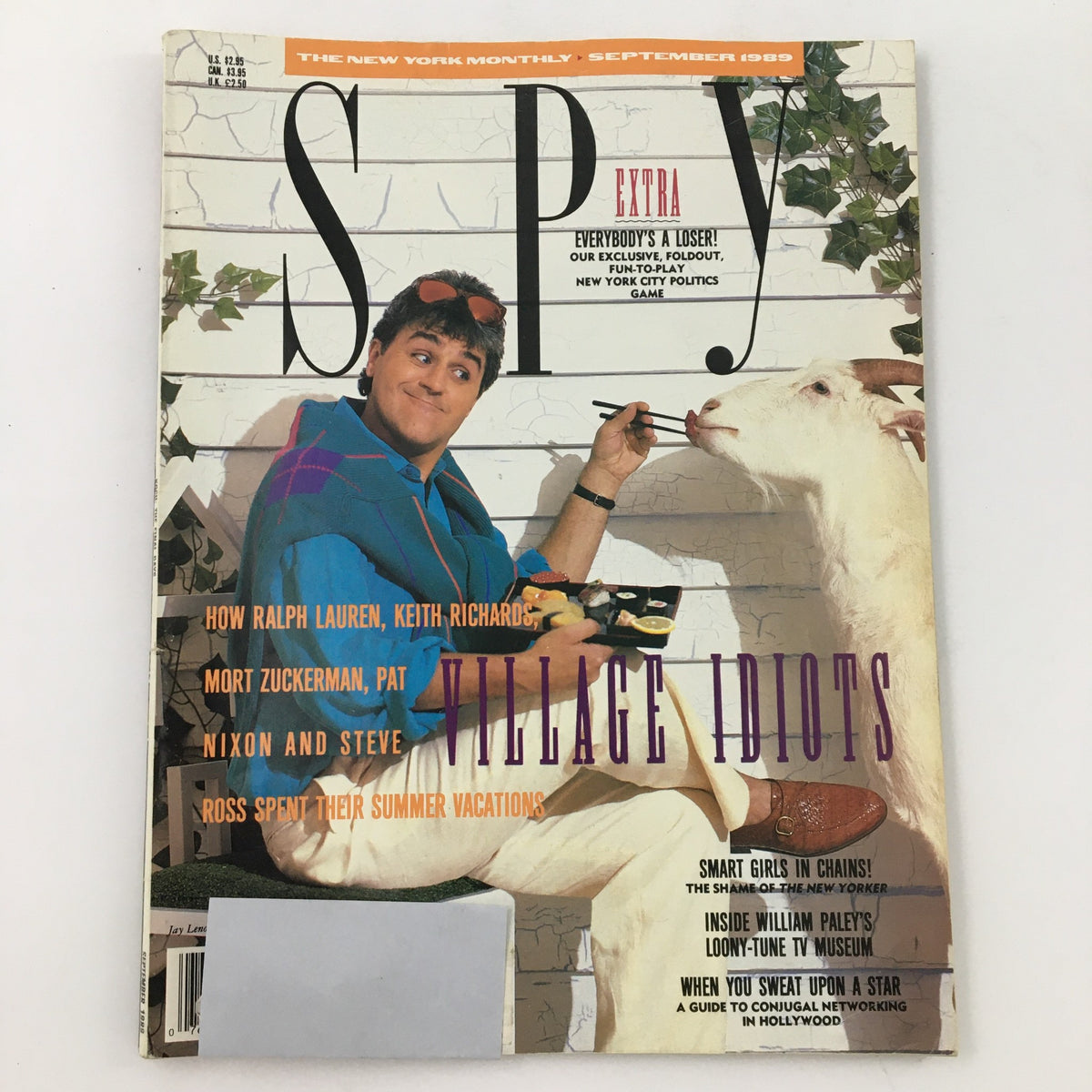 Cover of Spy Magazine September 1989 featuring headlines about Ralph Lauren, Keith Richards, and Mort Zuckerman, showing a whimsical image of a man with chopsticks sitting next to a goat.