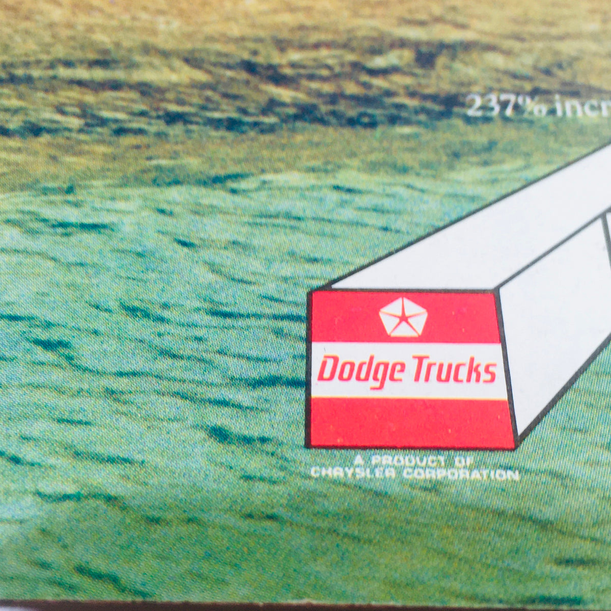 Close-up of the Dodge Trucks logo from the 1978 brochure, featuring the star emblem and the title 'A New Set of Adult Toys from Dodge'.