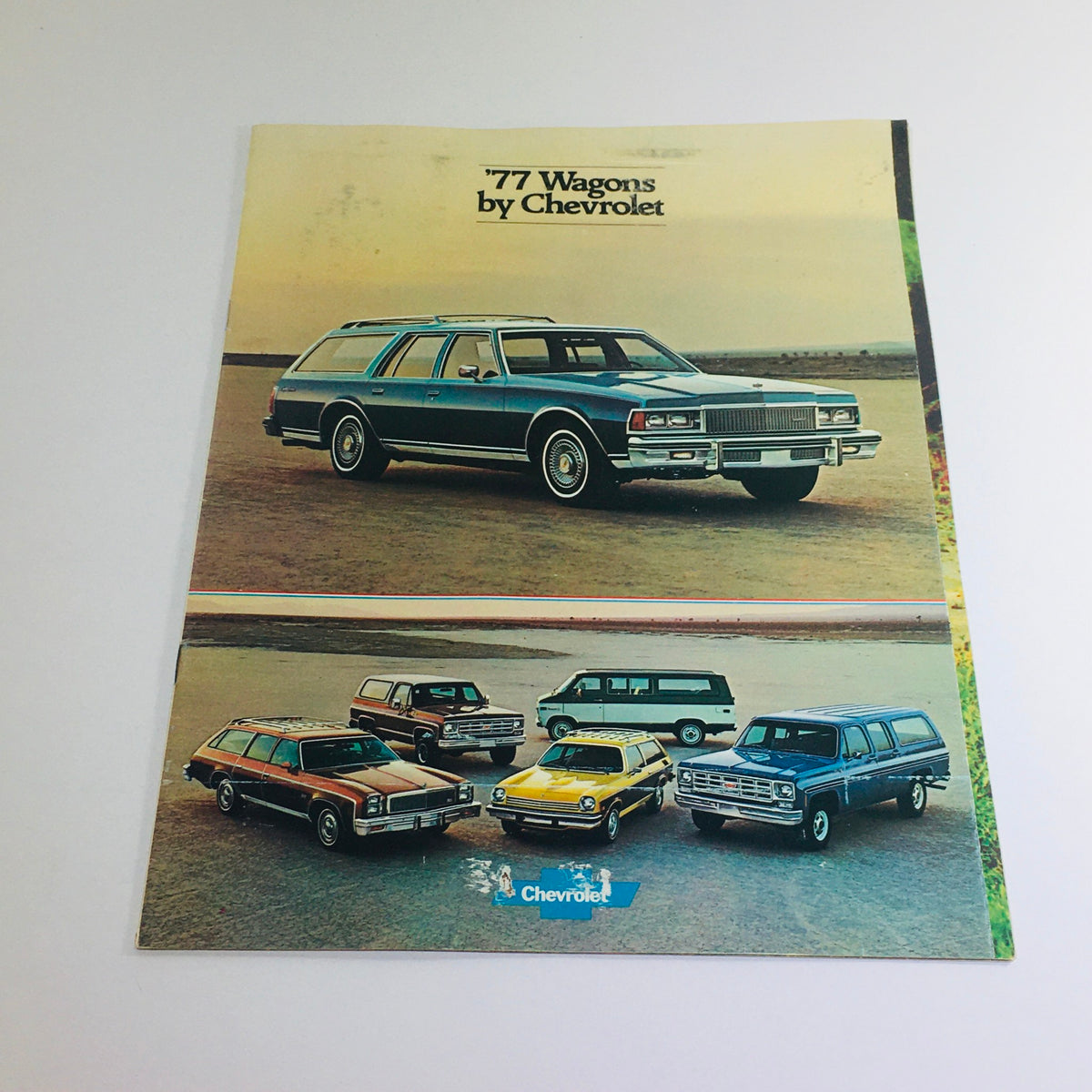 Vintage 1977 Caprice Classic Wagons by Chevrolet brochure cover featuring a blue wagon and various Chevrolet wagon models.