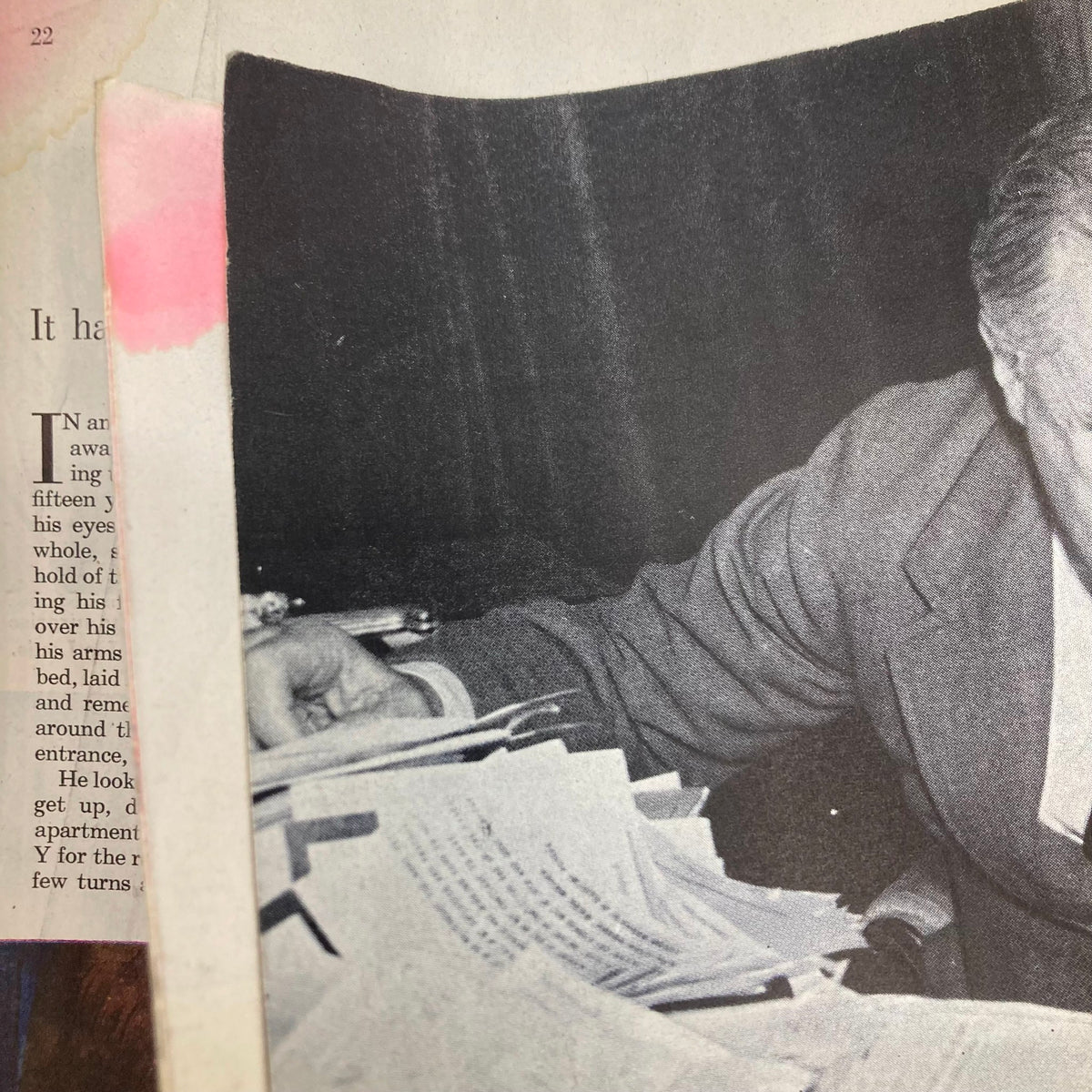 Image of a man seated at a desk surrounded by papers, reflecting the busy atmosphere of a mid-20th century office. Featured in the Saturday Evening Post Magazine June 12 1948 Illustrated Cover by John Atherton.