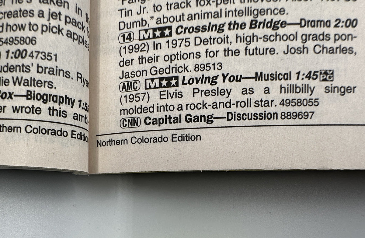 Close-up of TV Guide Magazine August 16, 1997, showing a listing for the film 'Loving You,' starring Elvis Presley, included in the program schedule.