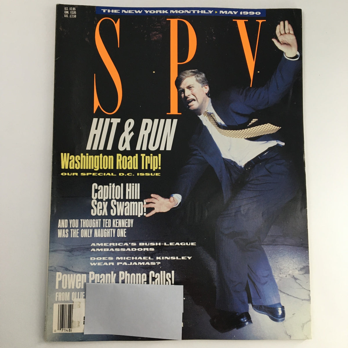Spy Magazine May 1990 cover featuring humorous satirical headlines including 'Hit & Run' and 'Washington Road Trip!' showcasing the political and pop culture essence of the era.