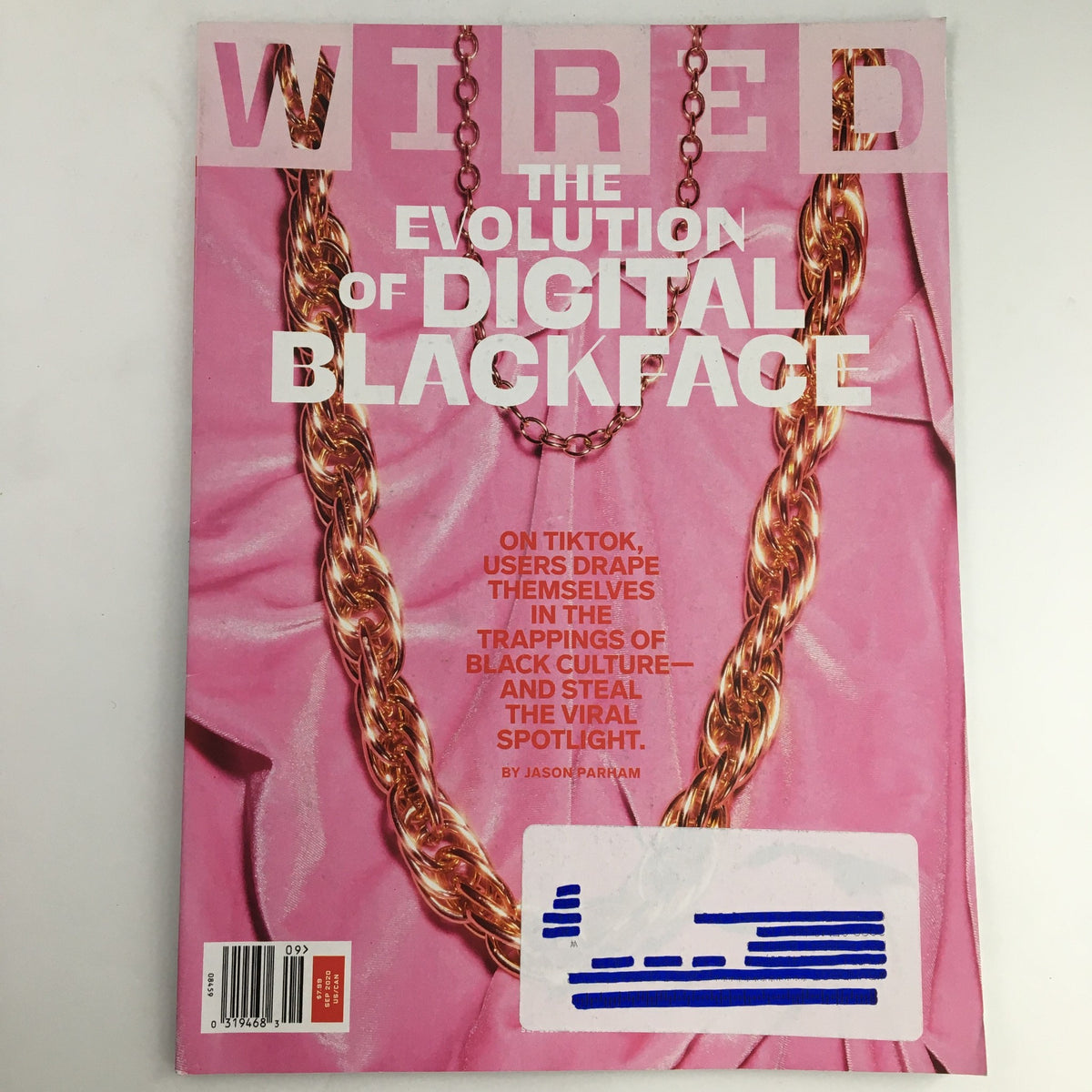 Cover of Wired Magazine September 2020 titled 'The Evolution of Digital Blackface', featuring a pink background and gold chain graphic, discussing cultural themes and digital identity.