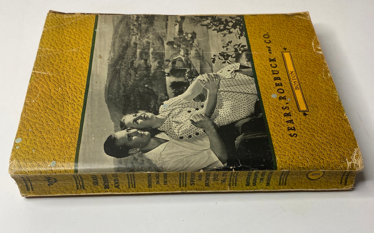 Side view of the 1937 Sears, Roebuck and Co. Boston Spring and Summer Catalog showcasing its vintage design with a couple's photograph and textured yellow cover.