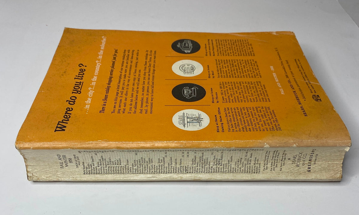 Edge view of the 1956 Sears Roebuck and Co. Fall and Winter Catalog, highlighting its vintage condition and classic design.