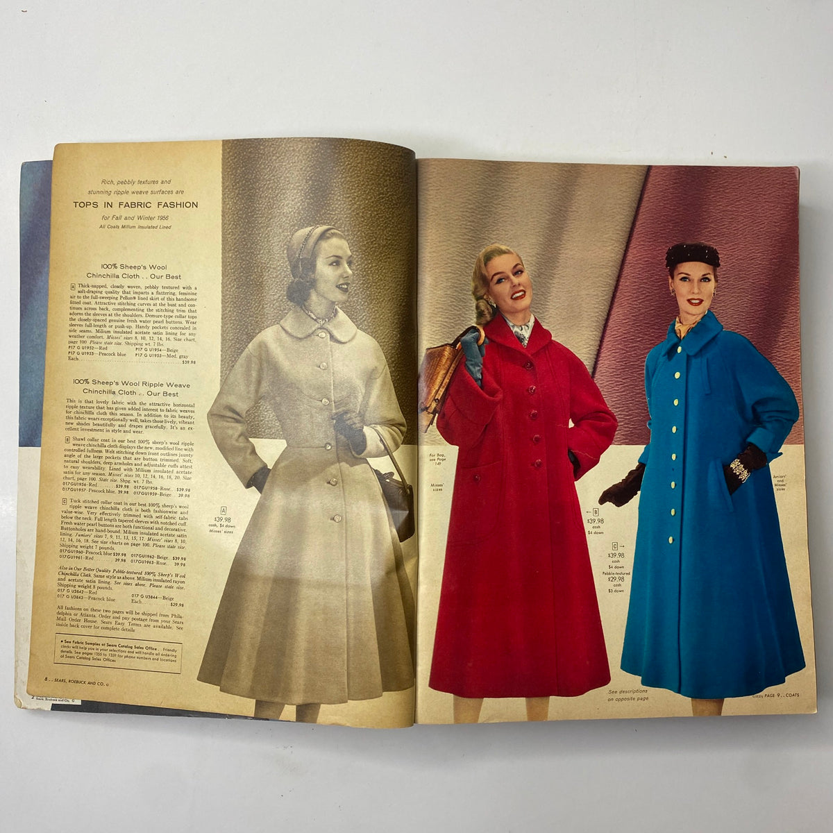 Fashion display of wool coats in vibrant colors from the 1956 Sears Roebuck and Co. Fall and Winter Catalog, emphasizing the elegance of 1950s clothing styles.