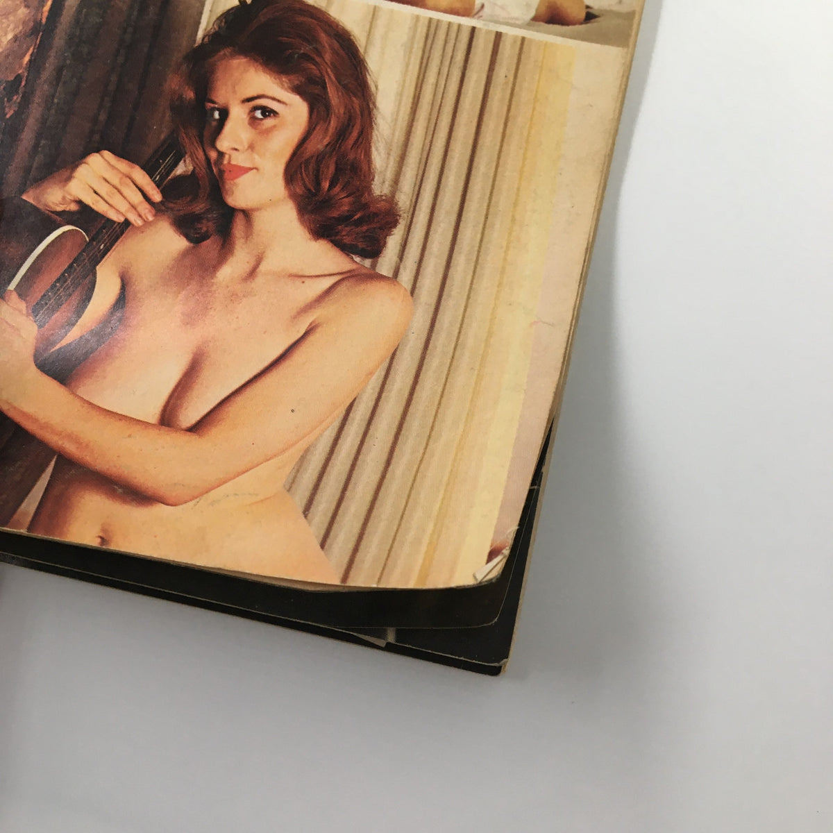 Interior page of VTG Mr. Annual Magazine Spring 1968 showcasing a model holding a guitar, embodying the playful and artistic essence of the era.