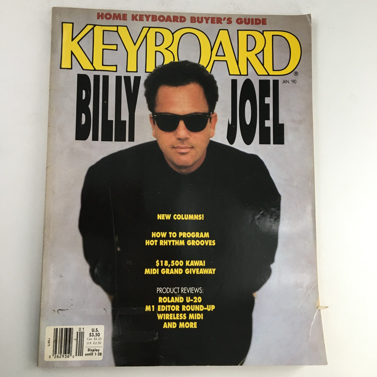 Cover of Keyboard Magazine January 1990 featuring Billy Joel, showcasing articles on the Roland U-20 synthesizer and M1 Editor Round-Up.