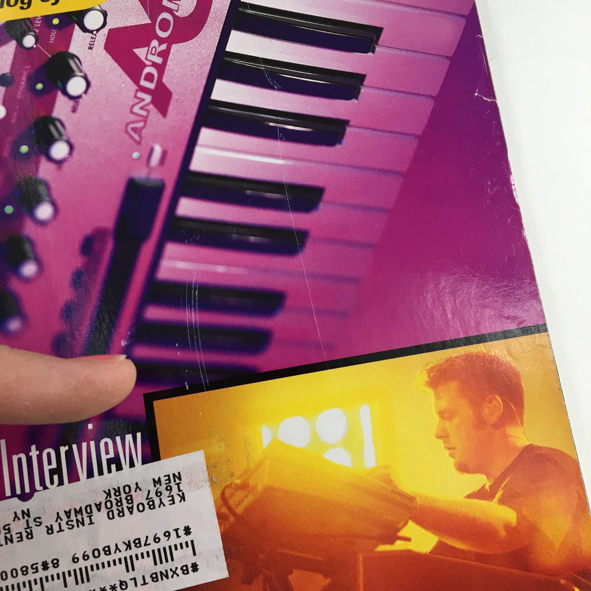 Back cover image of Keyboard Magazine April 2000 showcasing Alesis Andromeda synthesizer with a photo of a musician performing, emphasizing the magazine's focus on electronic music and pop culture.