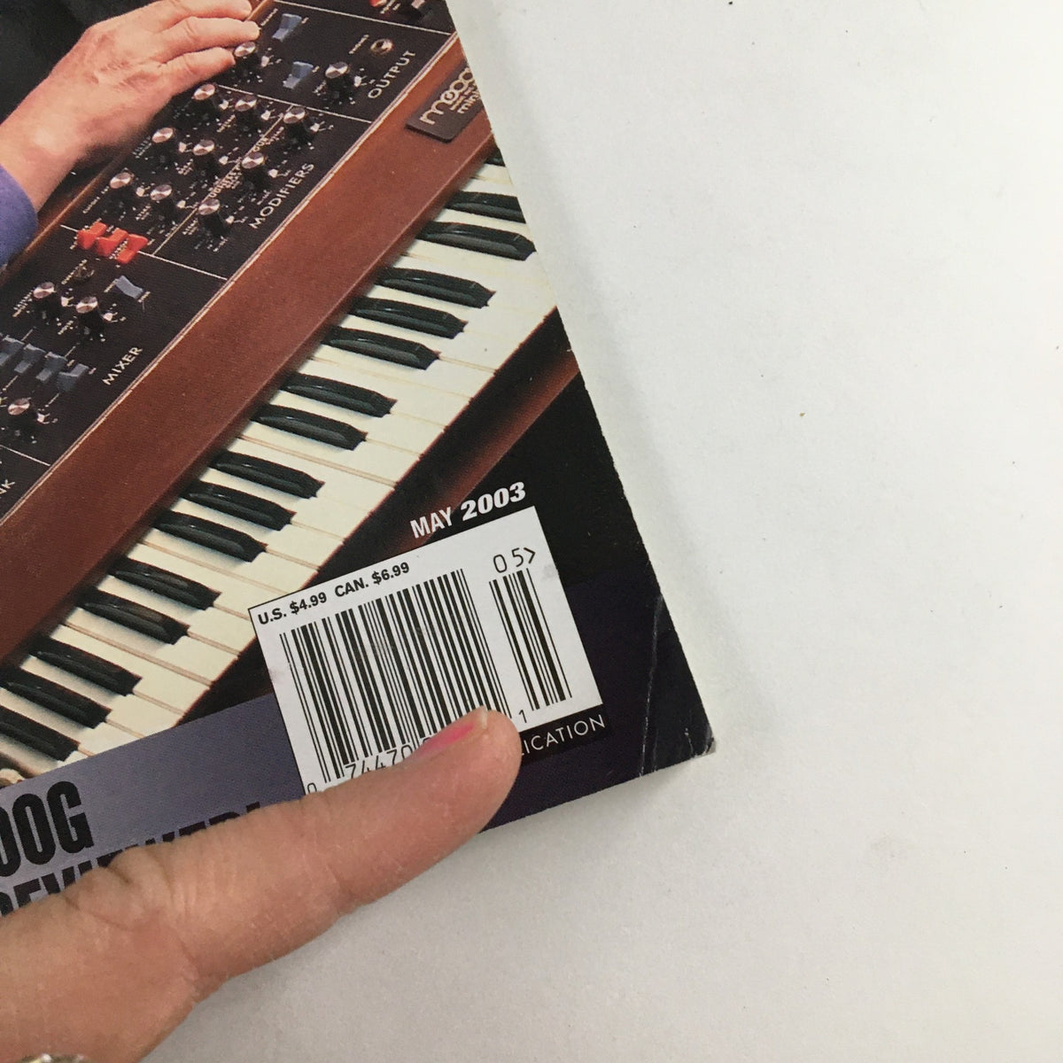 Barcode detail of Keyboard Magazine May 2003 showcasing the Arturia Moog. The magazine highlights synthesizers and includes a feature on Shakira's tour.
