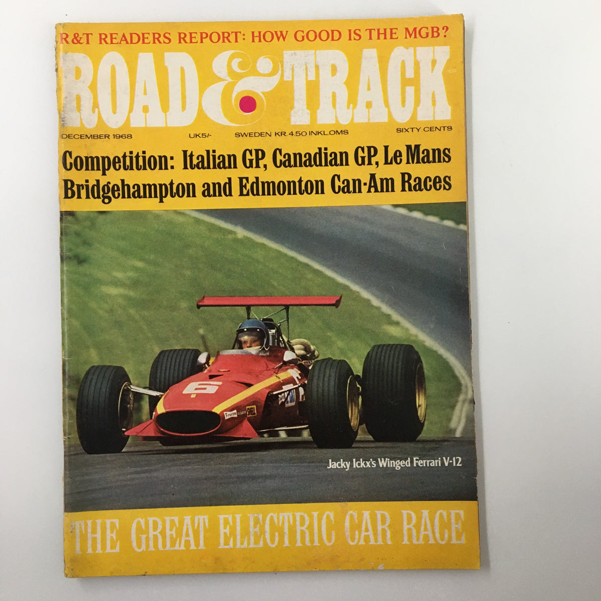 Cover of the VTG Road & Track Magazine December 1968 featuring Jacky Ickx and the Winged Ferrari V-12, showcasing exciting motorsport content and classic car racing themes.