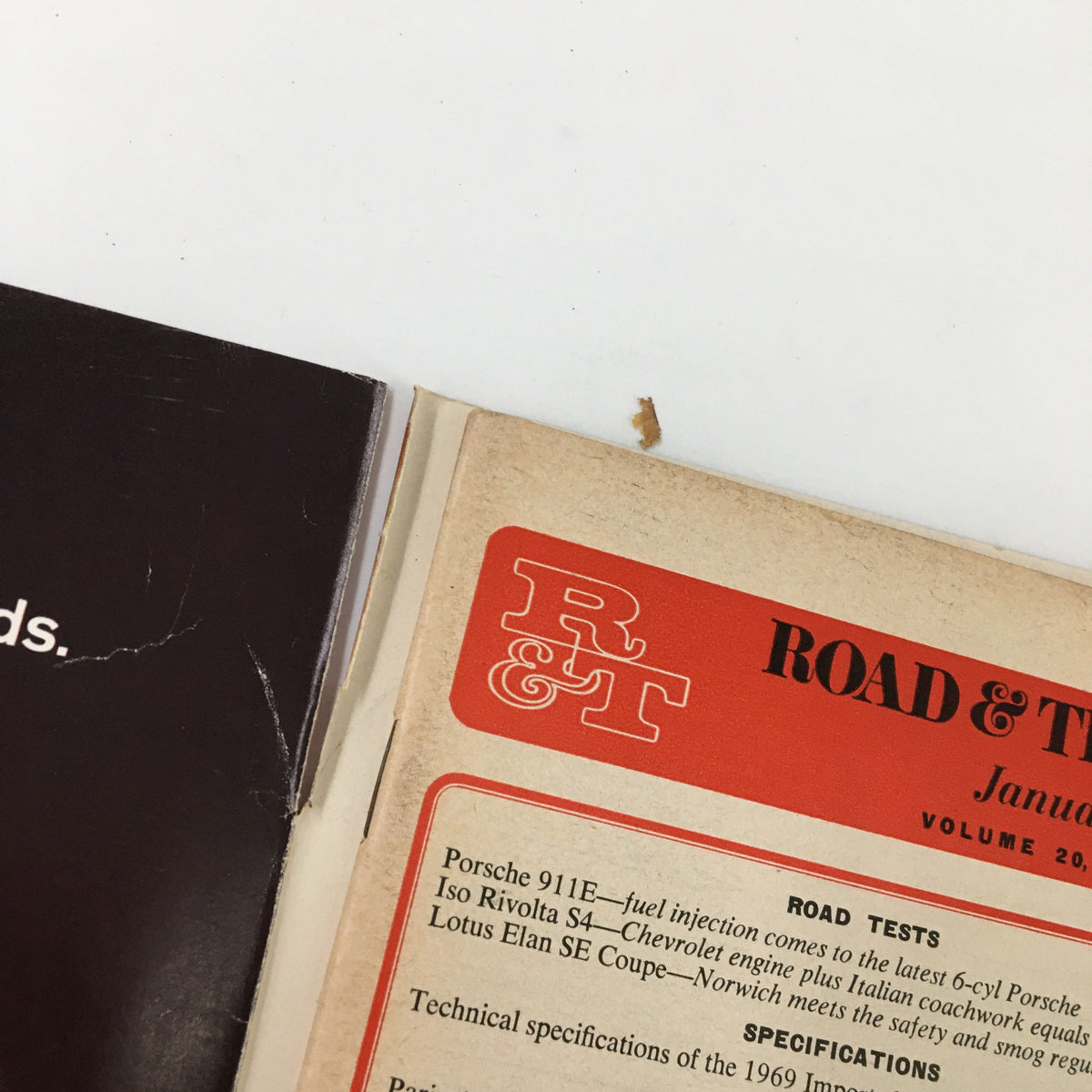 Close-up view of the inside cover of the VTG Road & Track Magazine January 1969, highlighting road test features including Porsche and Iso Rivolta.