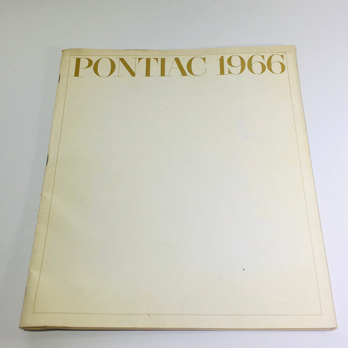 Cover of the 1966 Pontiac Brougham Specifications Dealership Car Auto Brochure Catalog showcasing the title 'PONTIAC 1966' in gold lettering, ideal for vintage automotive collectors.