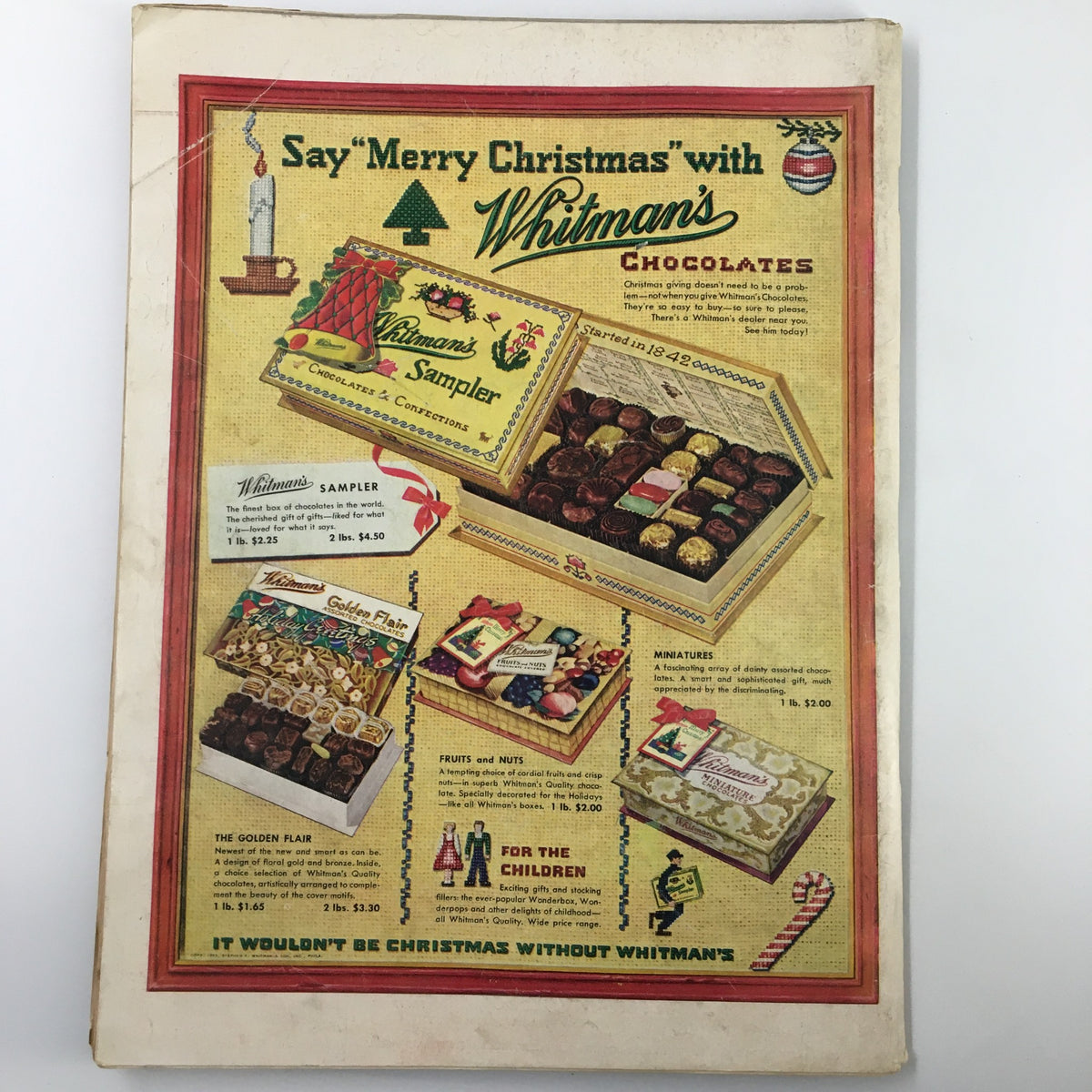 Back cover of VTG Life Magazine December 7 1953 displaying an advertisement for Whitman's Chocolates, highlighting festive gifts for the season.