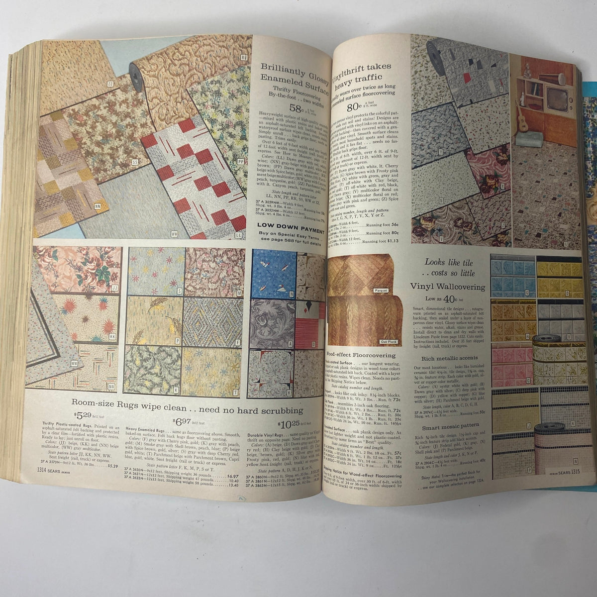 Home décor section of the 1961 Sears Roebuck and Co. Spring and Summer Catalog showcasing colorful rugs and flooring options with prices.